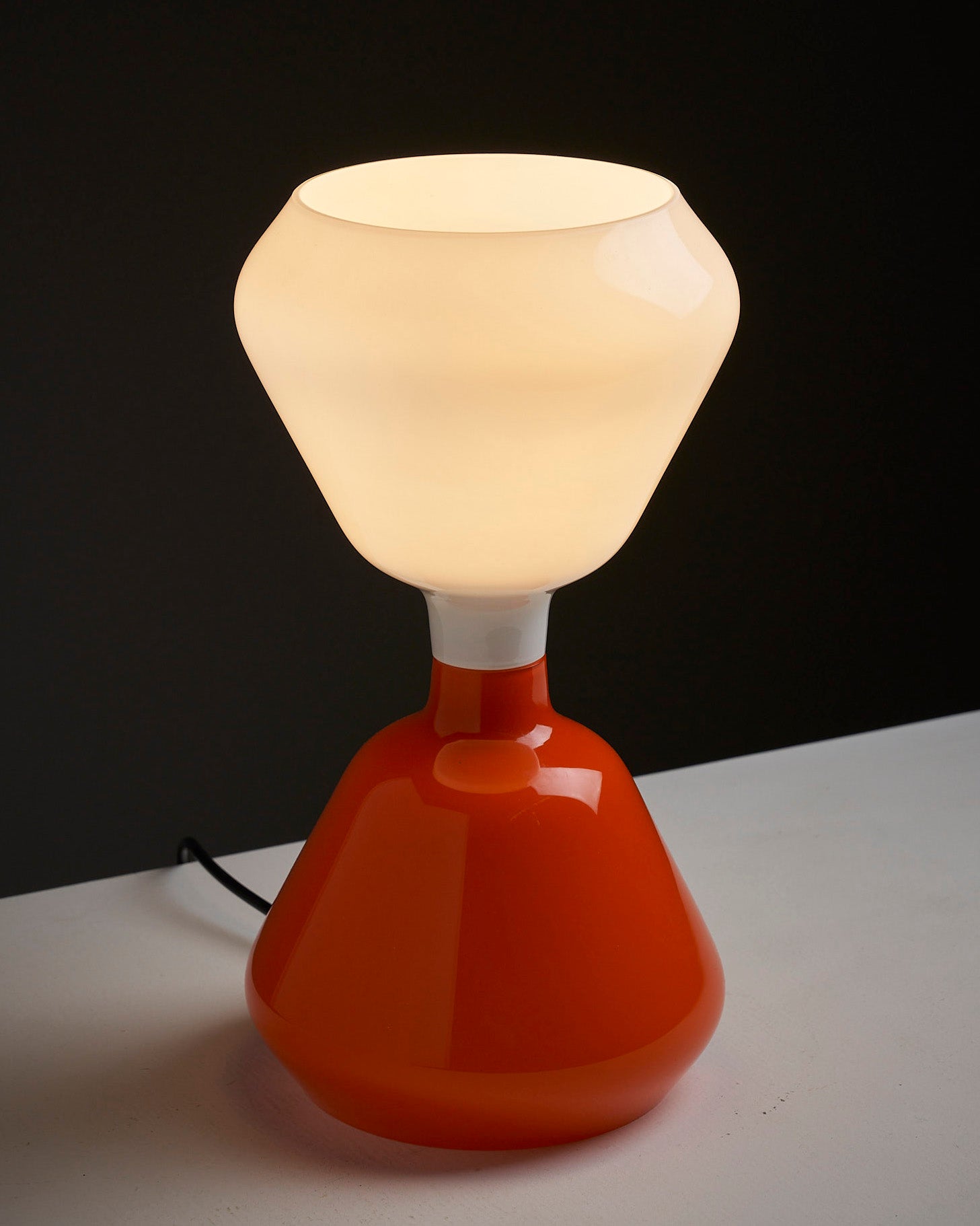 Table Lamp in orange and opal glass By Peter Pelzel for the brand Vistosi Italy