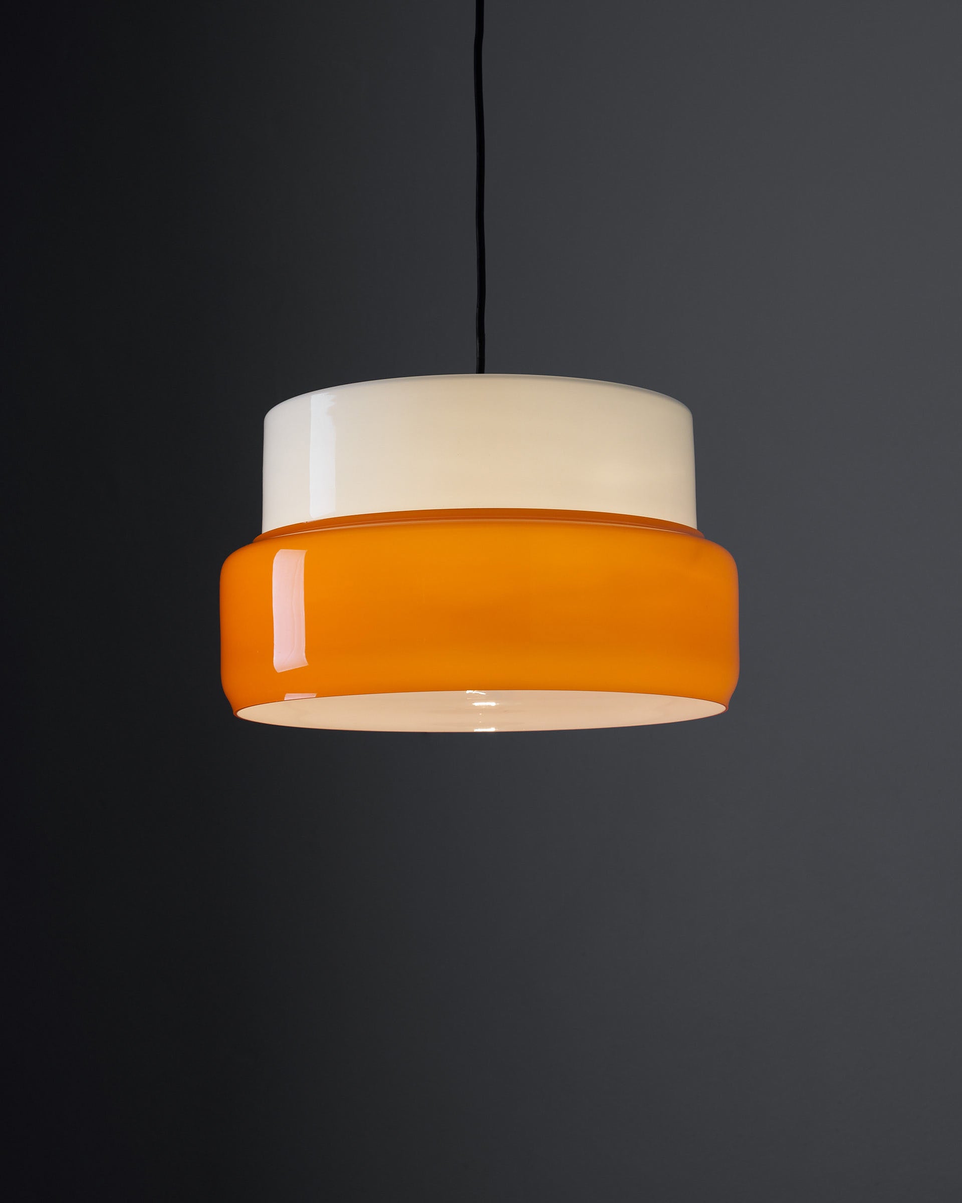Pendant Lamp by the brand Vistosi from Italy, Lamp in Orange in Opal Murano glass.