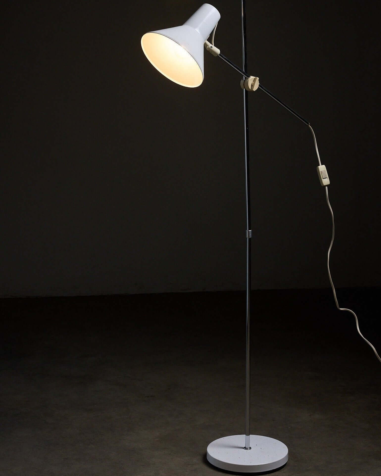 Adjustable Floor Lamp in White Enamel and Chrome, 1970s with a sleek design and warm light.