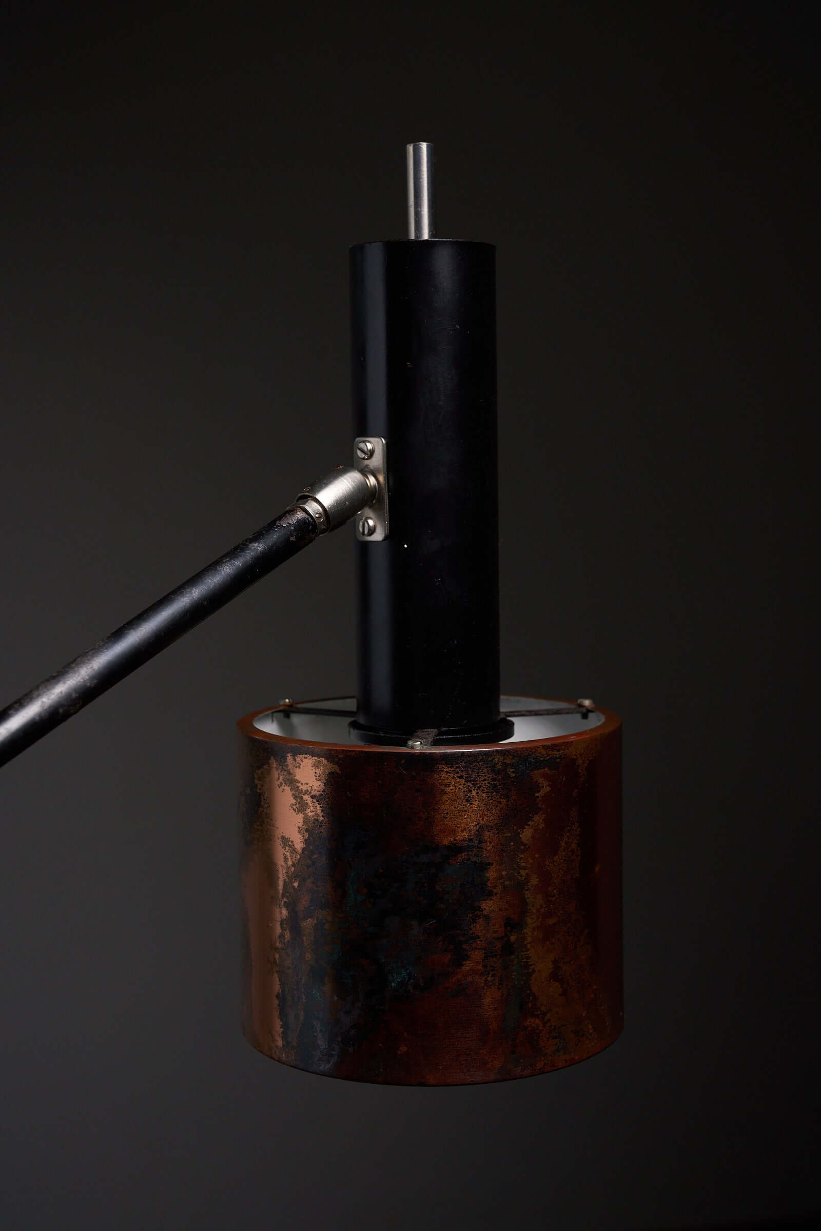 Floor lamp in black steel and copper shade, 1970s showcasing the unique copper patina and modernist design.