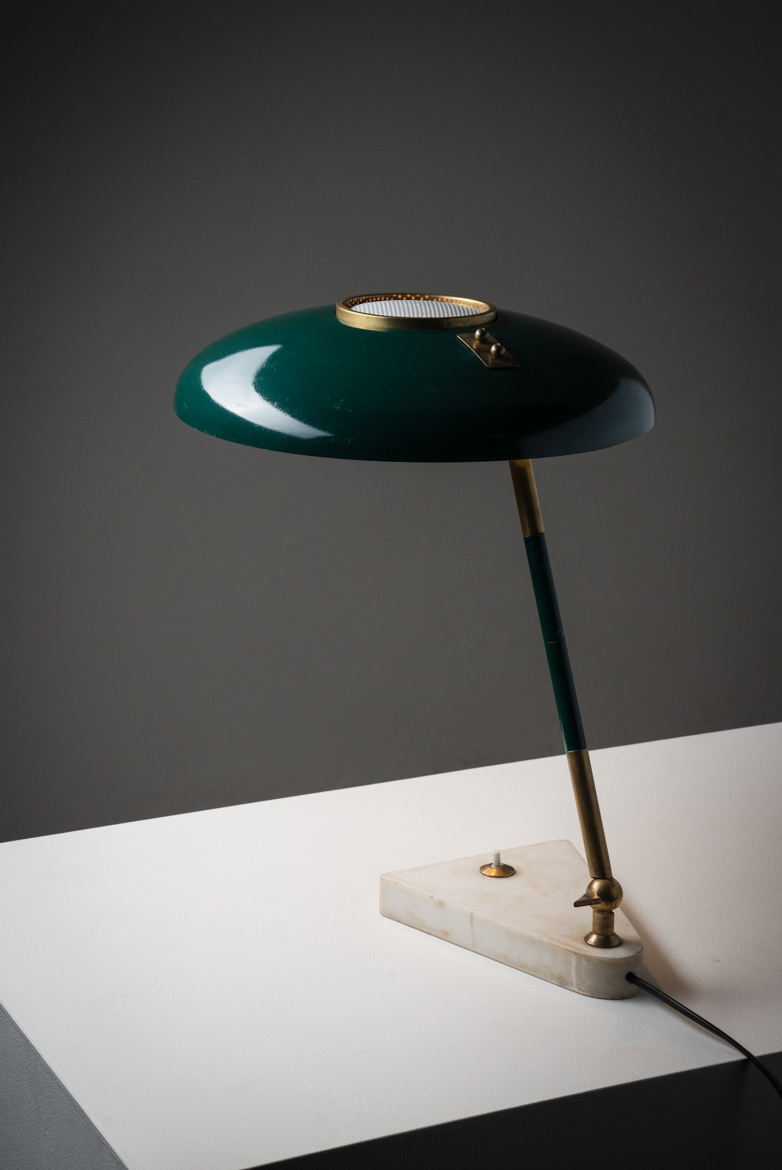 Desk lamp by Oscar Torlasco for Stilux in green metal, brass and Carrara marble, Italy, 1950s on a white surface.