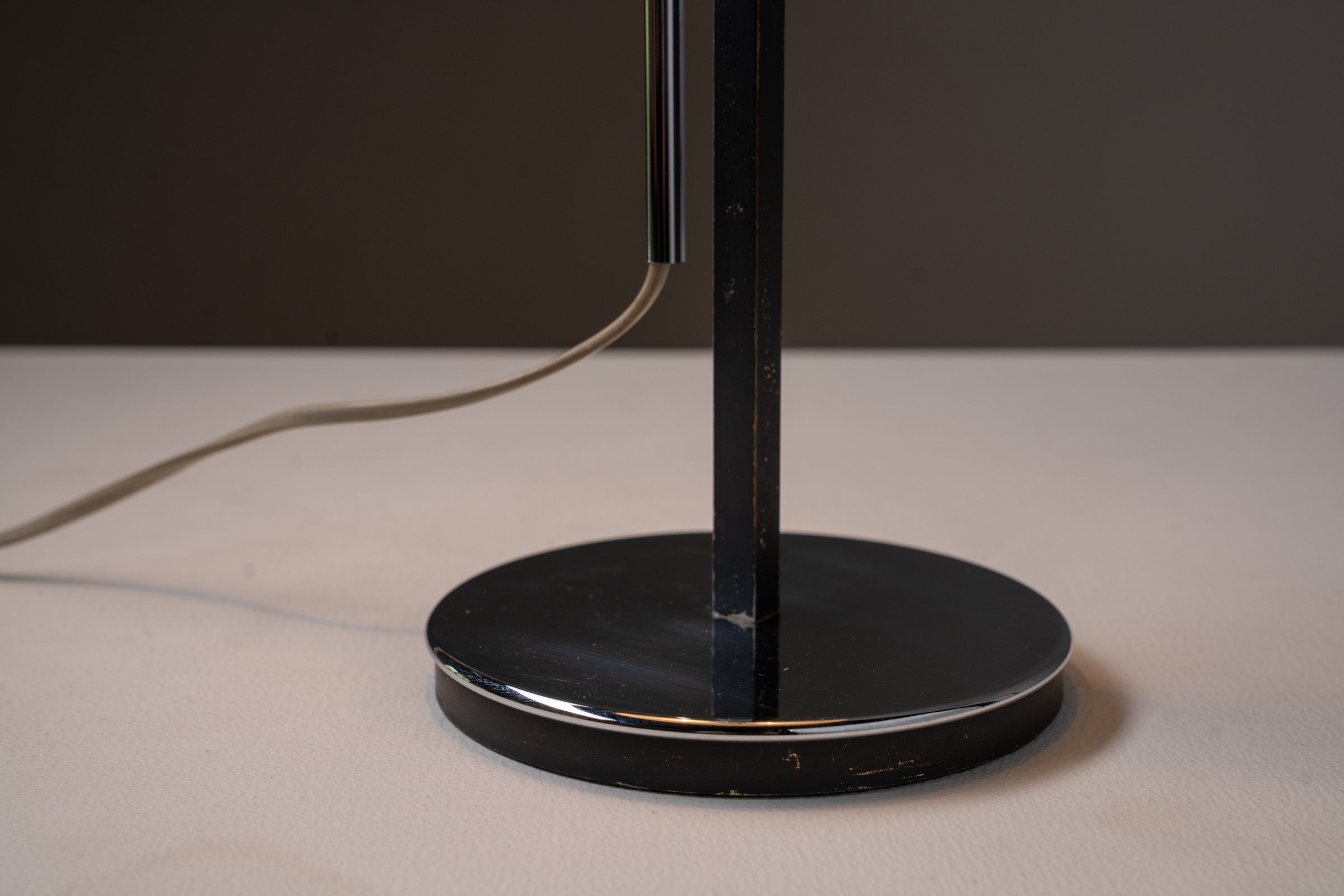 Close-up of the base of an Adjustable Anthracite Table Lamp in Chrome, 1970s showcasing its design features.