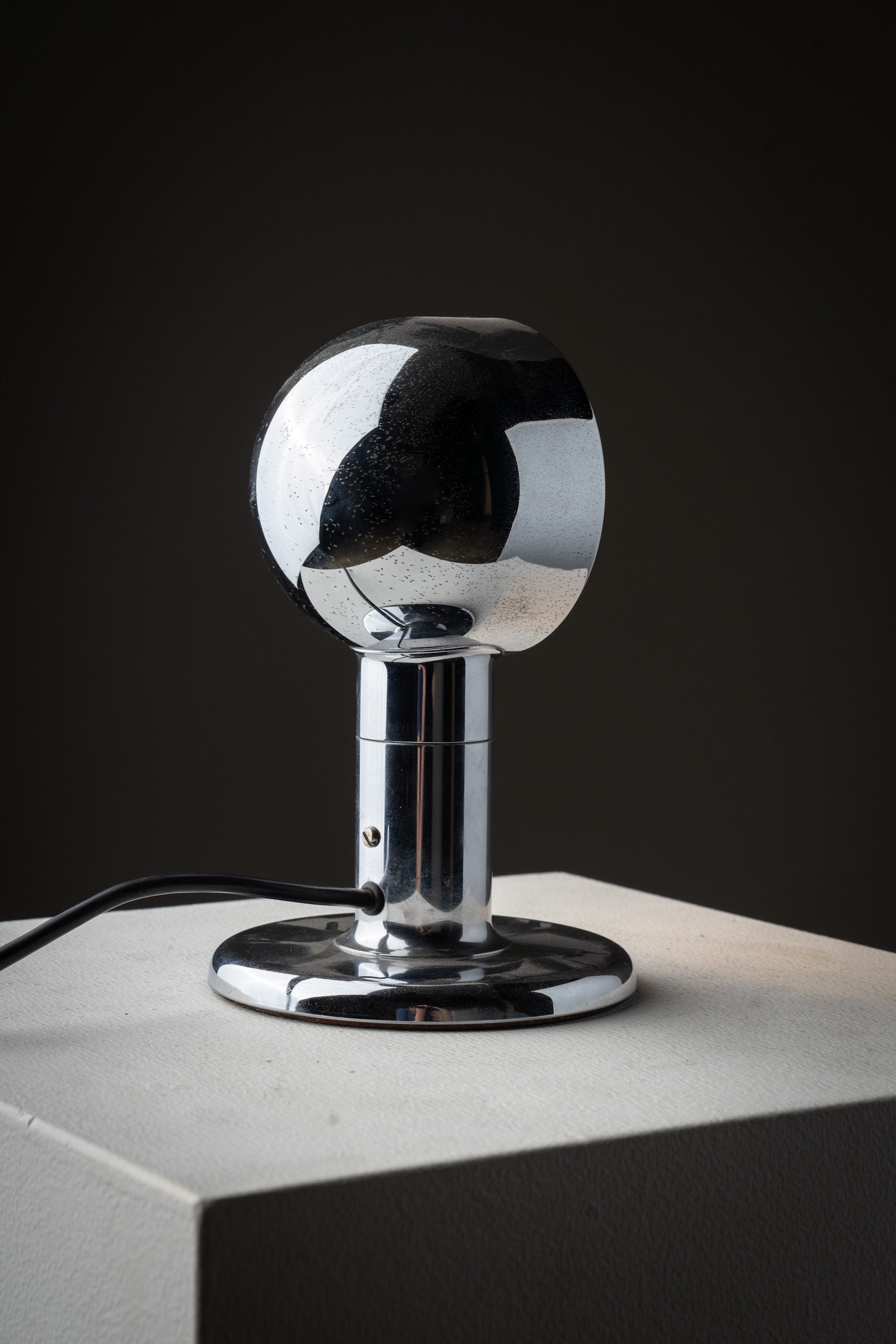 Small Space Age Chrome Table Lamp, 1970s on a pedestal, showcasing futuristic design and reflective finish.