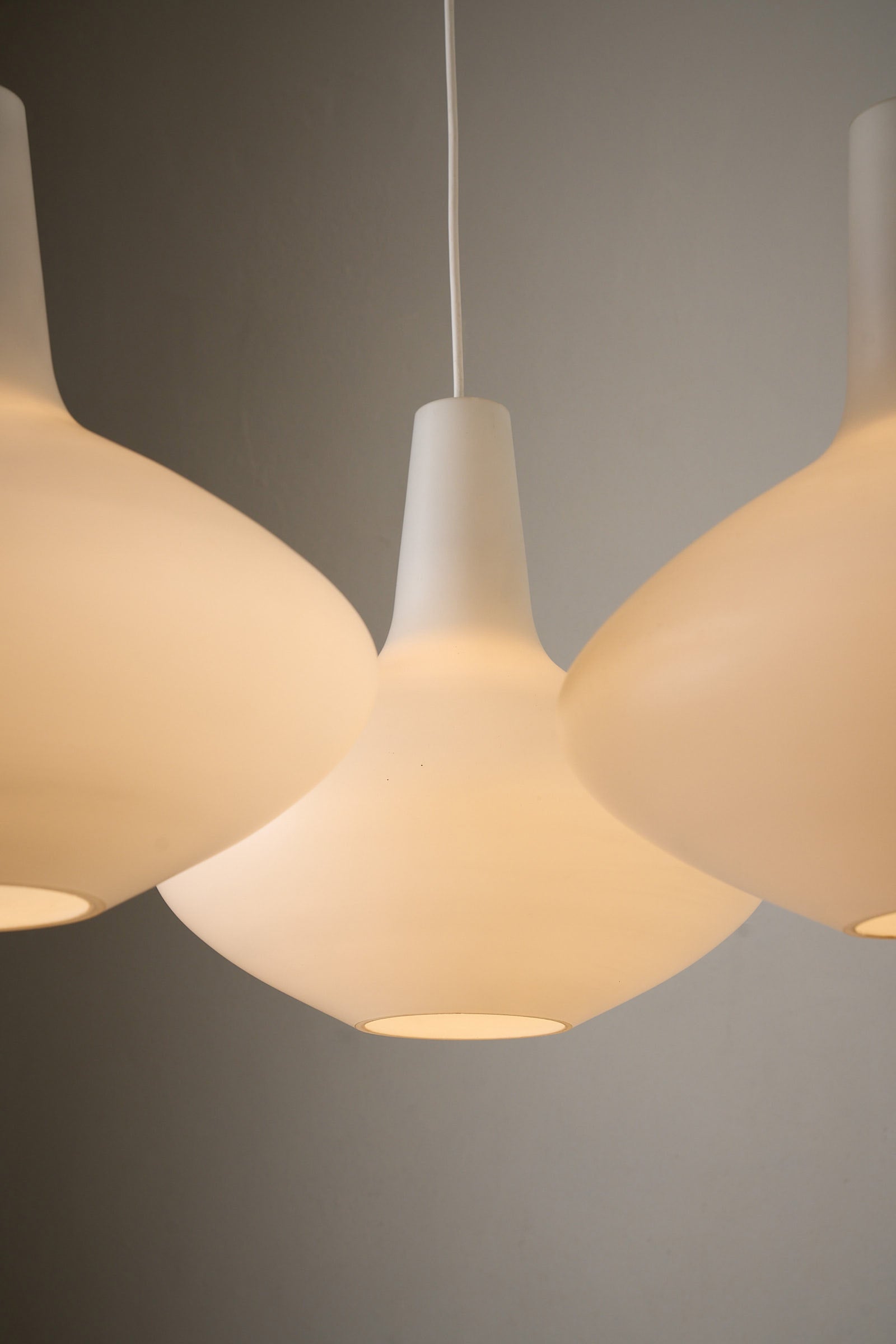 Johansson-Pape “Bulbo” chandelier for Stockmann Orno, Finland, 1950s with opaline glass globes.