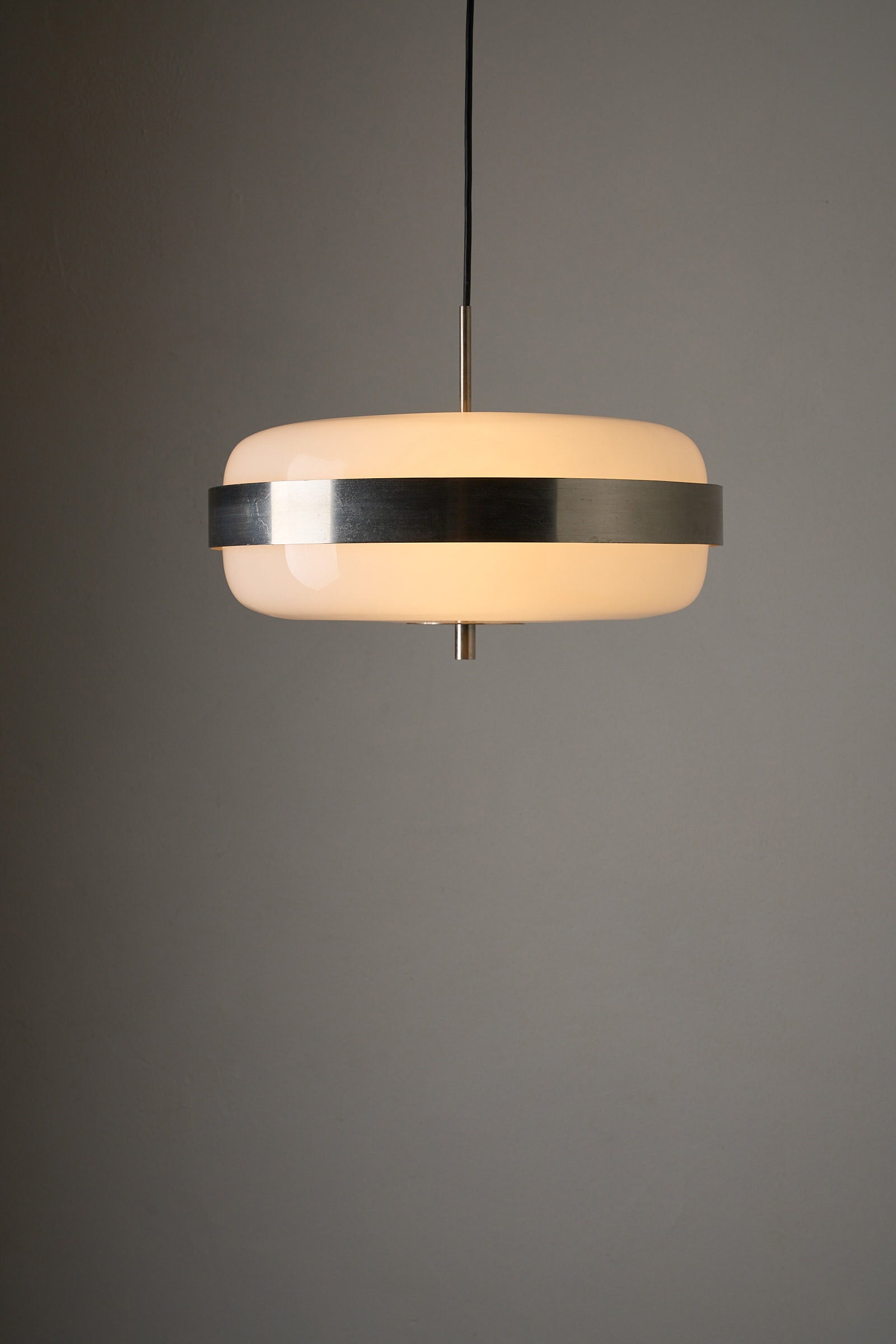 Artiforte H1018 Ceiling Lamp in Opaline Acrylic and Brushed Nickel, 1970s hanging elegantly in a modern setting.