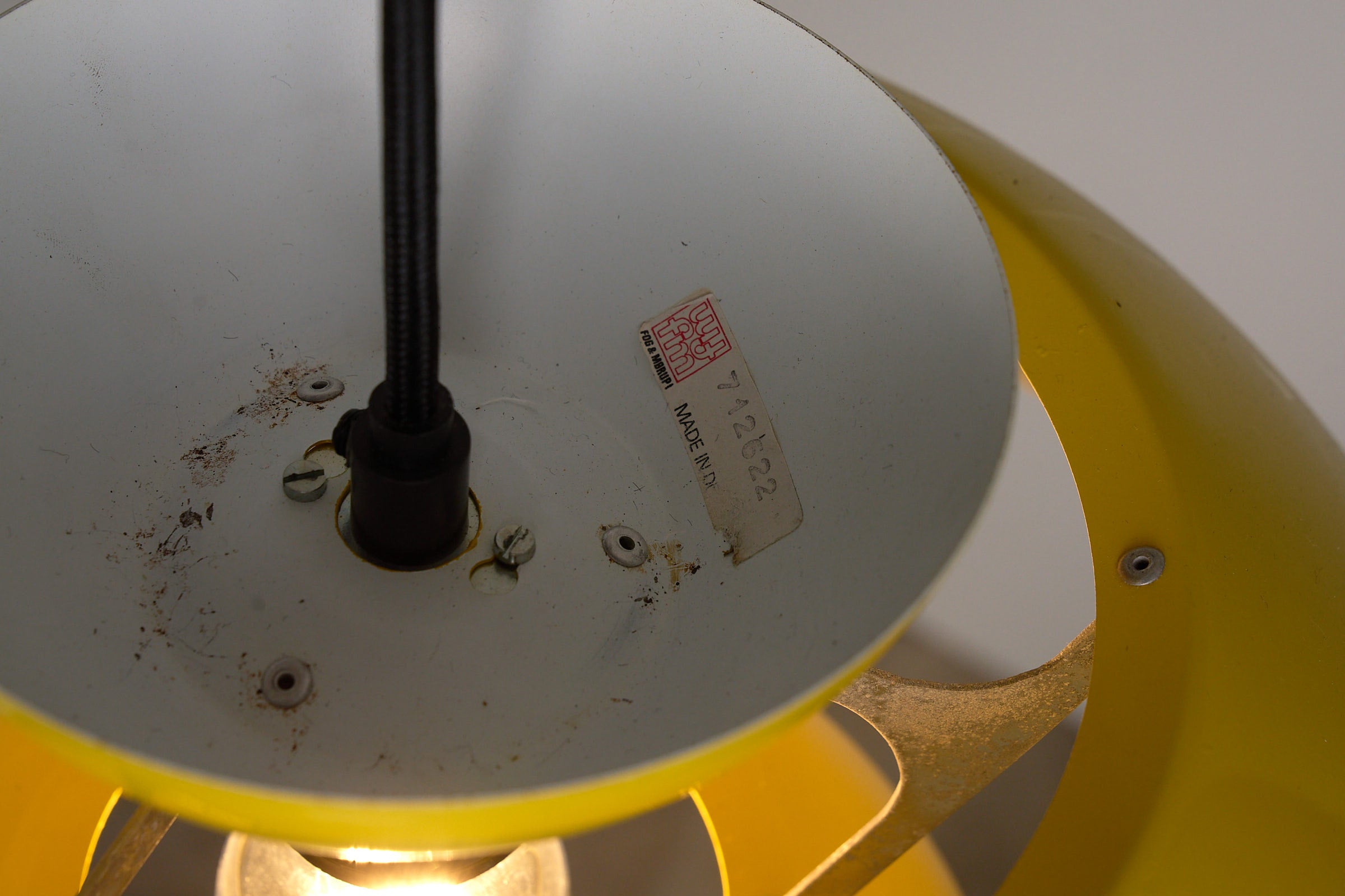 Fog & Mørup Yellow Metal Pendant Lamp, Denmark, 1960s, showcasing the underside view and lamp's interior details.
