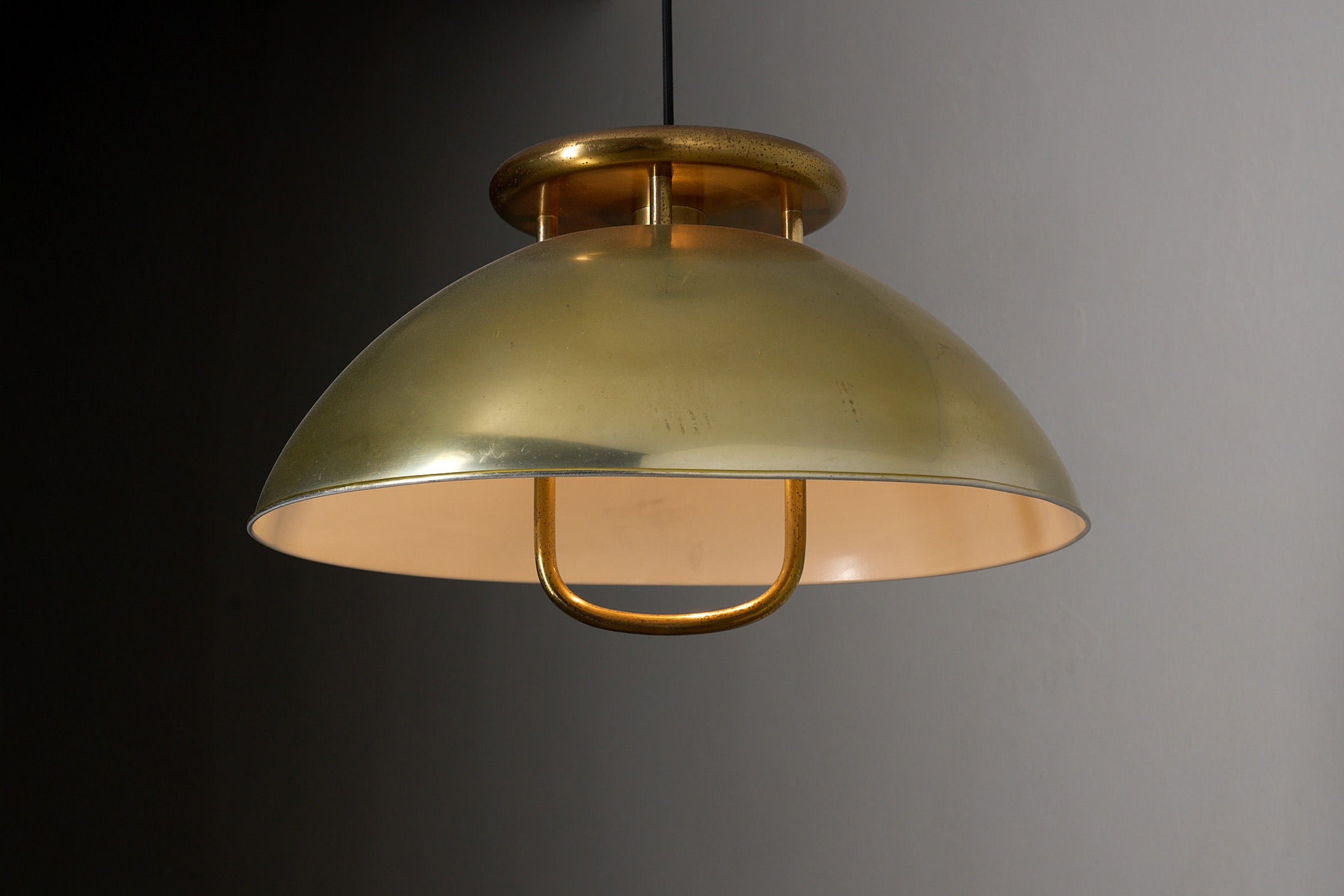 Brass Pendant Ceiling Lamp, 1960s, Scandinavian Design hanging with a wide dome shade and soft downward light.