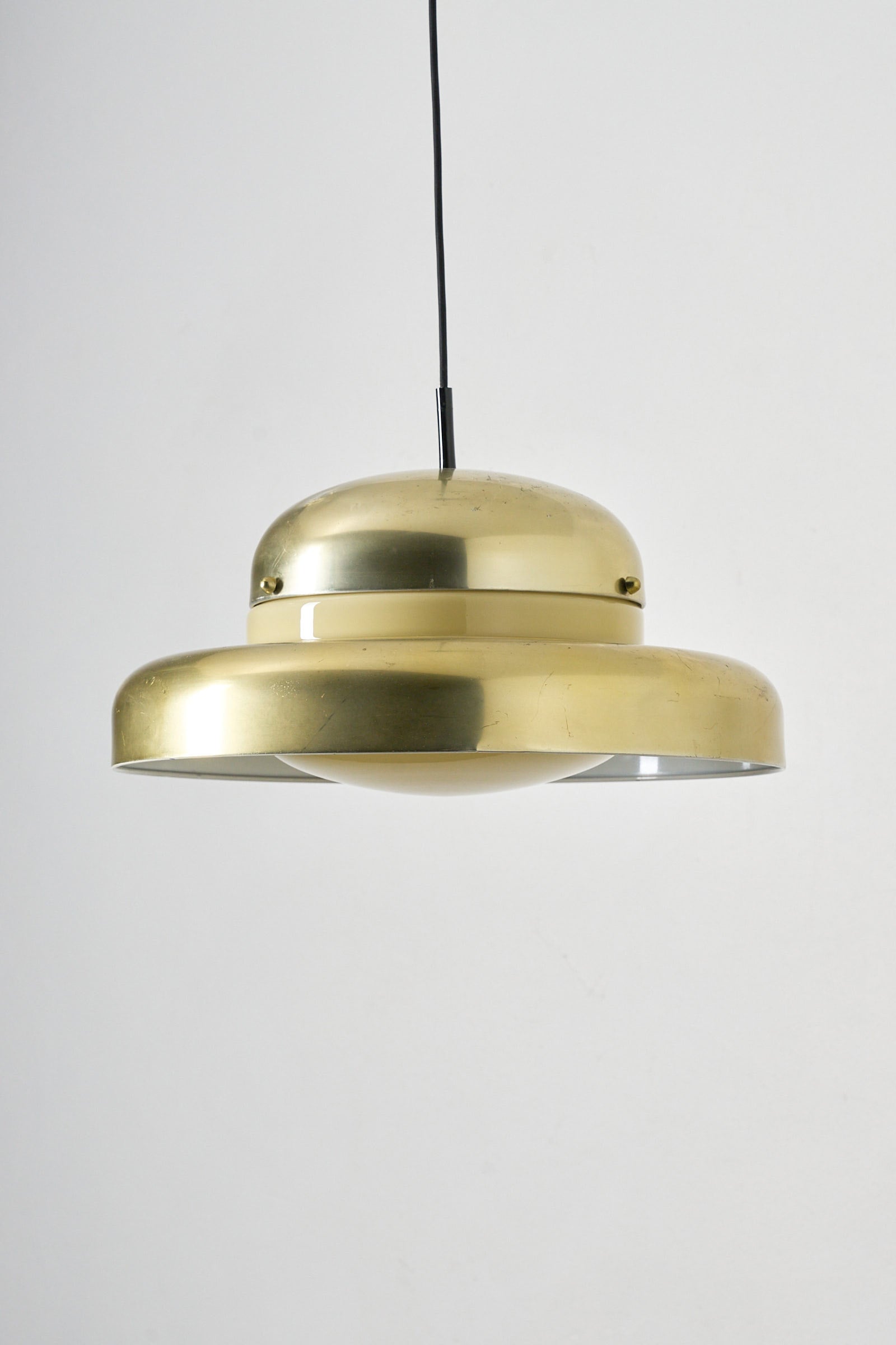 Large Brass and Yellow Glass Pendant showcasing mid-century modern elegance with a soft yellow glow.
