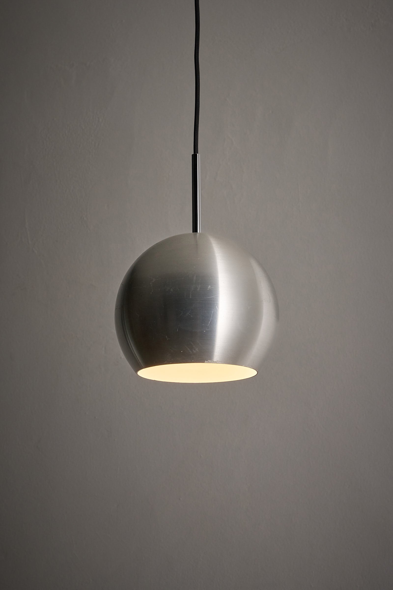 Brushed Aluminium Sphere Pendant by Cosack, Germany, 1960s hanging over a plain background, showcasing mid-century design elegance.