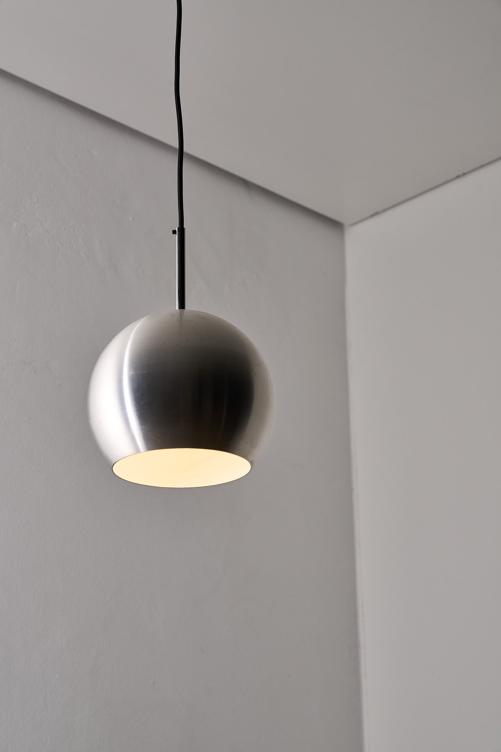 Brushed Aluminium Sphere Pendant by Cosack, Germany, 1960s hanging in a modern interior space.