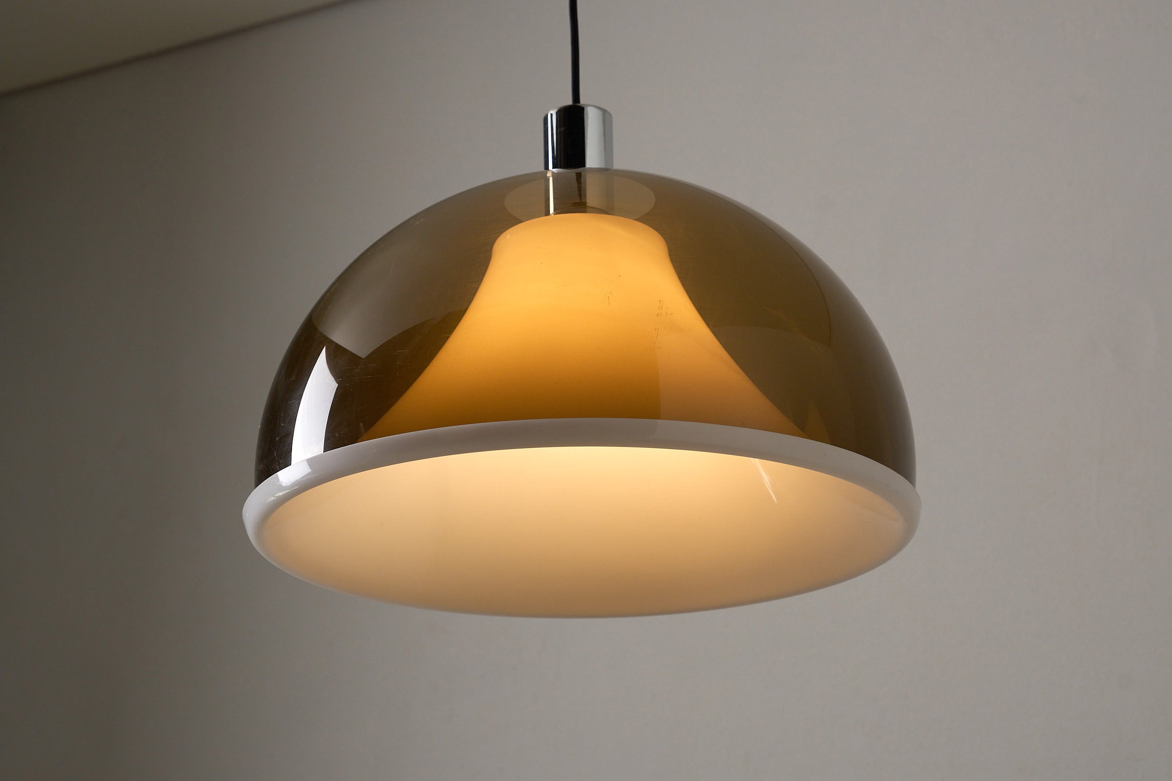 Space Age Ceiling Lamp in Brown Smoked Acrylic, 1970s with dome-shaped shade and soft glow.