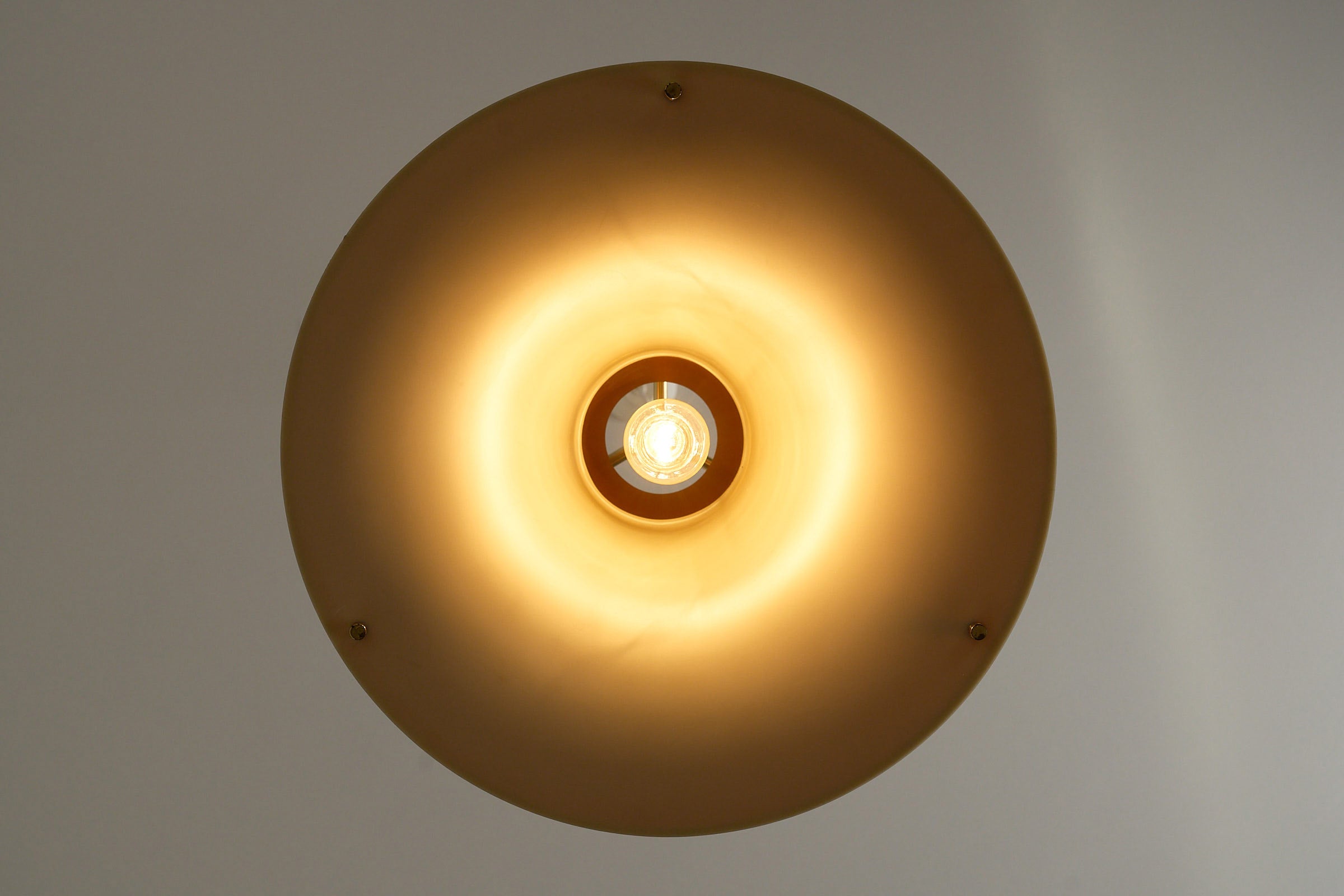 Fog & Mørup “Single” Pendant Lamp by Jo Hammerborg, 1970s showcasing warm caramel tones and soft diffused glow.