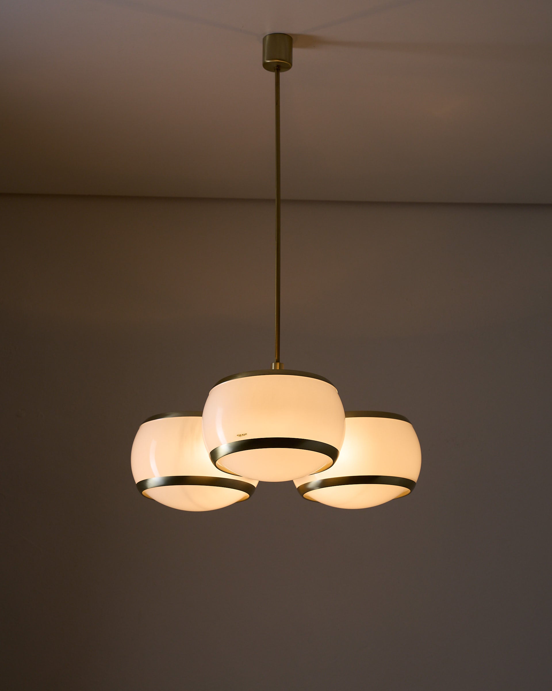 Stilux Milano “Aragona” Ceiling Lamp, Italy, 1960s featuring three opaline globes and brass accents.