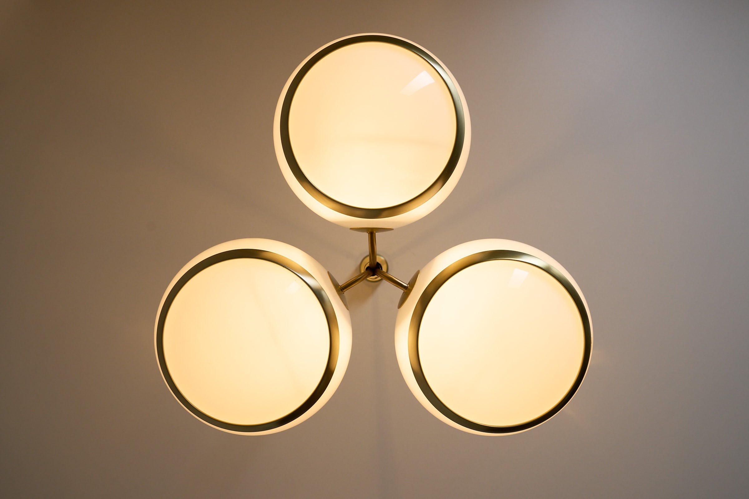 Stilux Milano “Aragona” Ceiling Lamp, Italy, 1960s featuring three spherical opaline globes and brushed brass details.