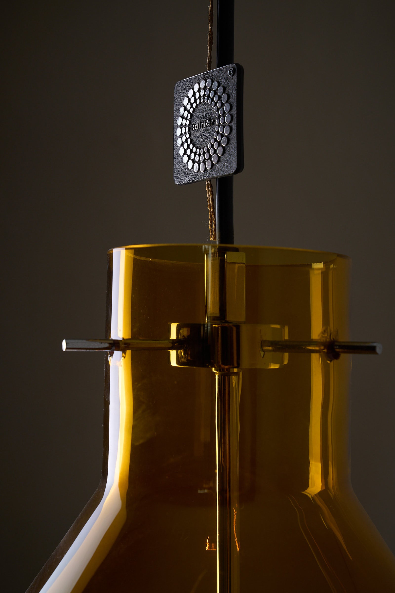 Amber Glass and Leather Pendant Lamp by J.T. Kalmar close-up view showcasing the unique amber glass shade and leather accent.