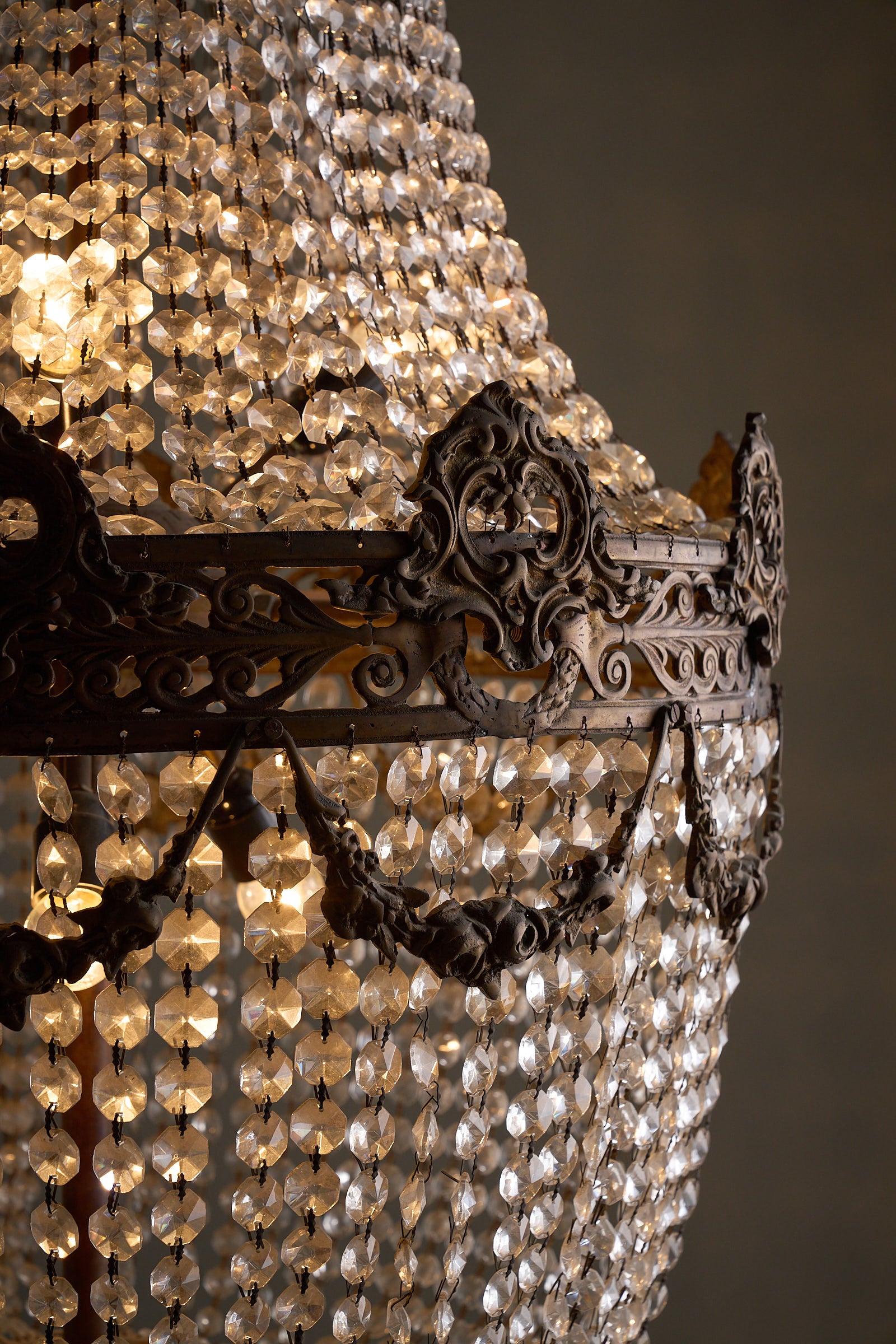 Crystal Basket Chandelier, France/Belgium, 20th Century with gilt bronze detailing and cascading crystal beads.
