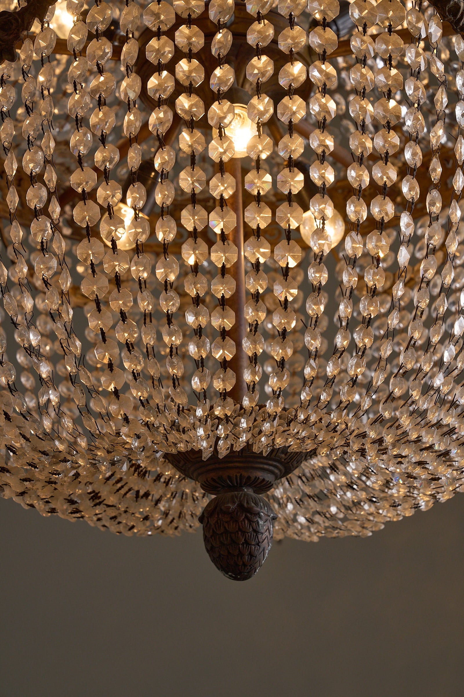 Crystal Basket Chandelier, France/Belgium, 20th Century with intricate crystal beads and gilt bronze detailing.
