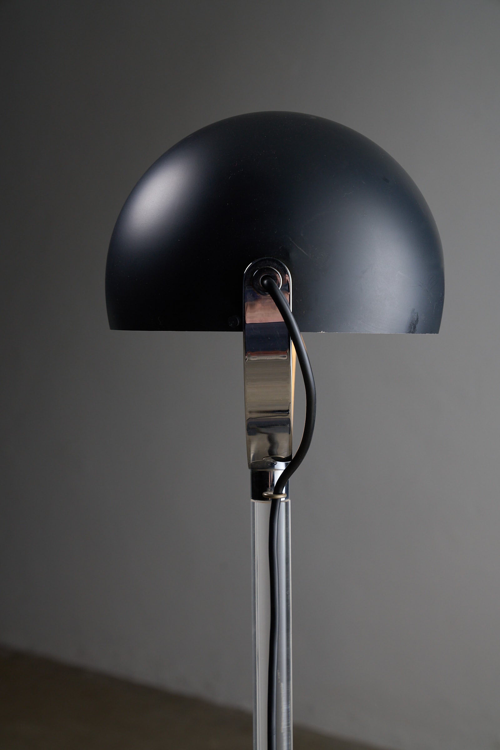 Cosack Floor Lamp with Plexiglass Stem in Anthracite, Germany, 1970s featuring a black hemispherical shade.