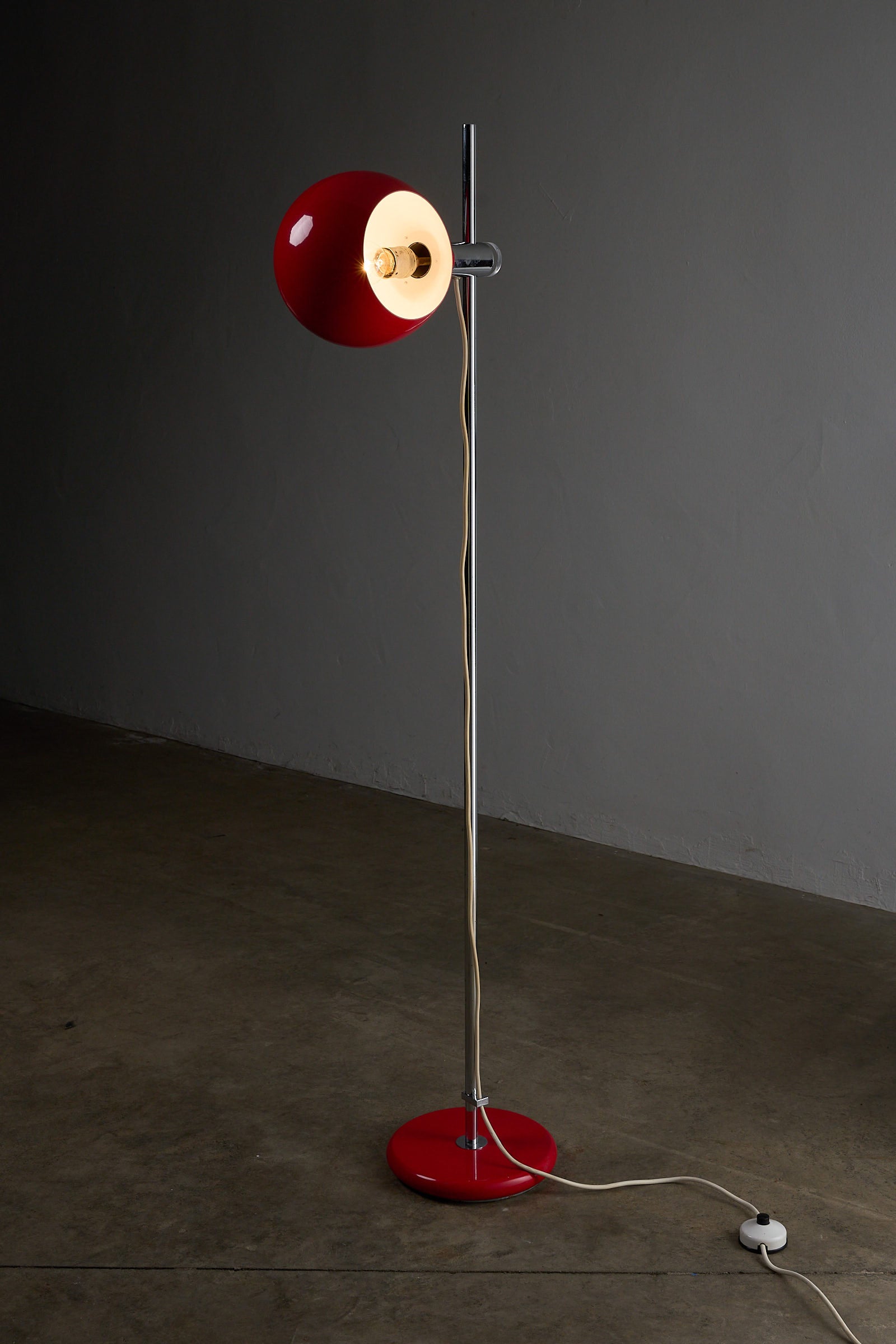 Red Sphere Floor Lamp by Cosack, Germany 1960s with adjustable shade and chrome-plated base.
