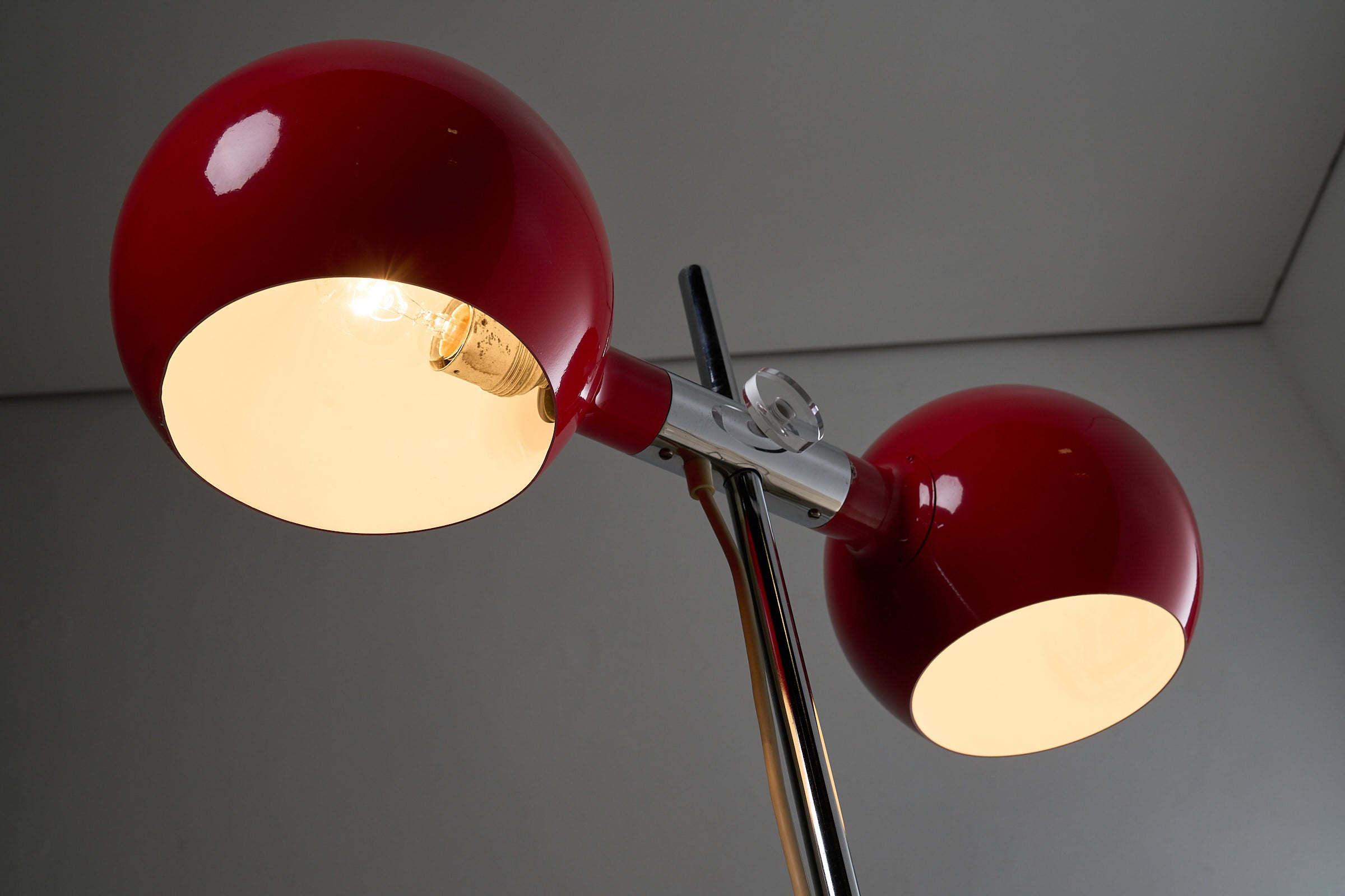 Red Double-Sphere Floor Lamp by Cosack, Germany 1960s with twin adjustable spheres and chromed stem.