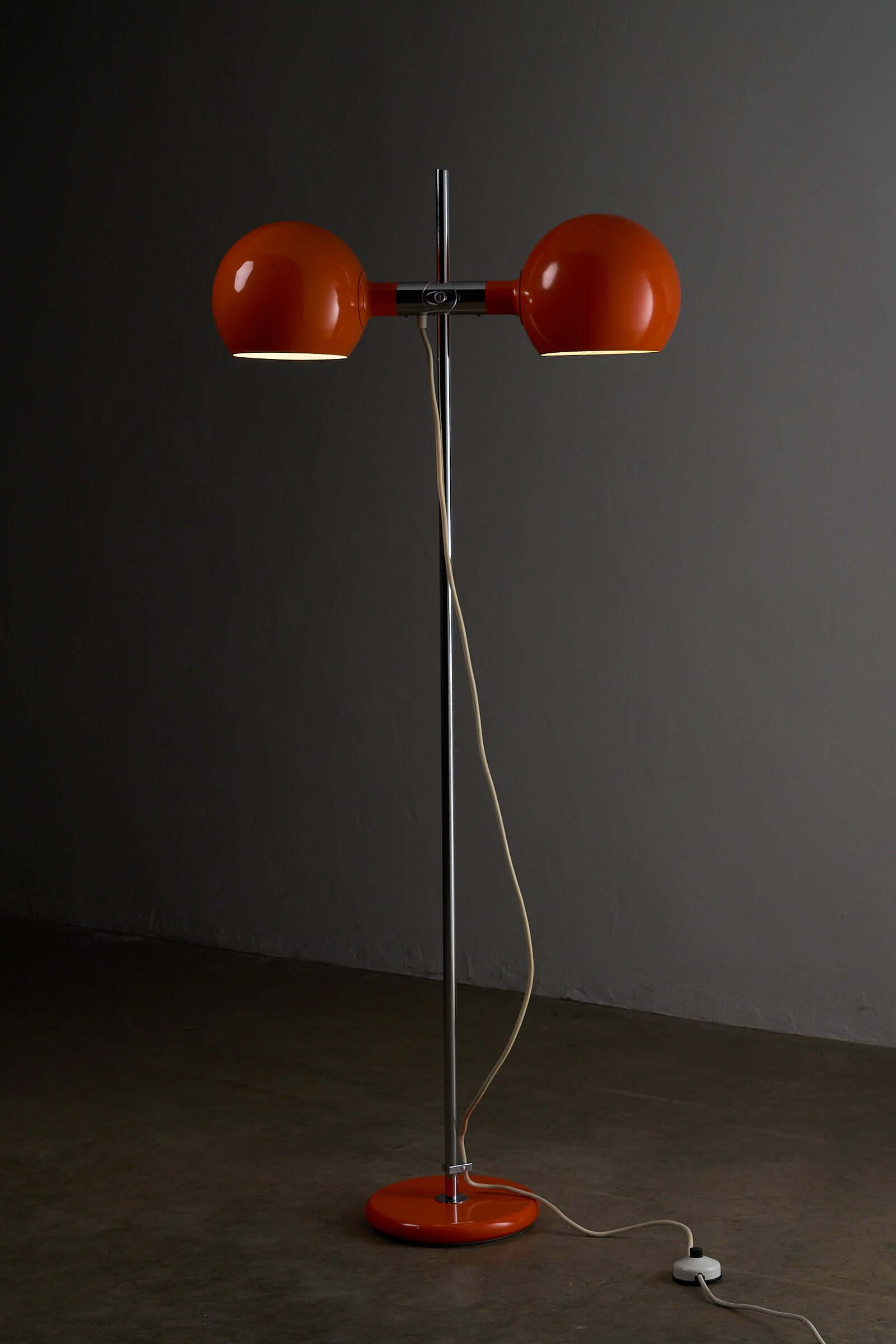 Red Double-Sphere Floor Lamp by Cosack, Germany 1960s showcasing twin adjustable spheres and chromed stem.