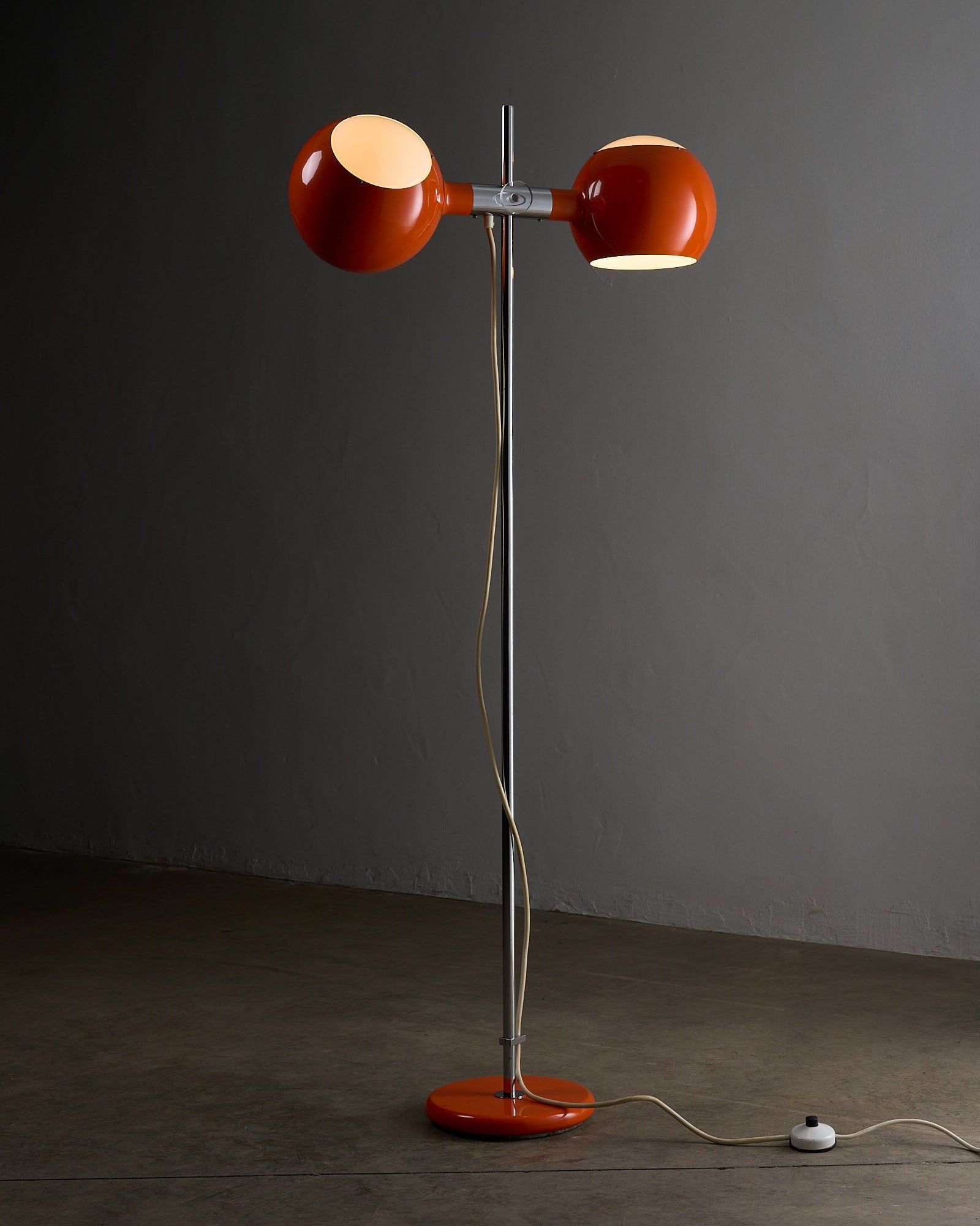 Orange Double-Sphere Floor Lamp with Diffuser in a modern interior setting, showcasing its unique design and style.