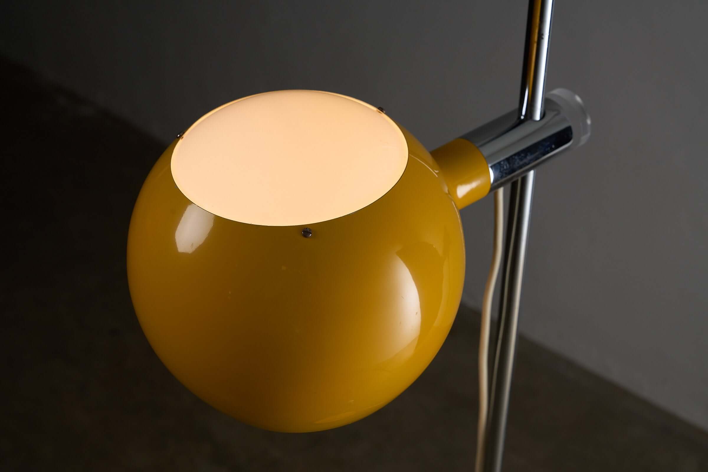 Yellow Sphere Floor Lamp with Diffuser showing the yellow lacquered metal shade and chrome stem.