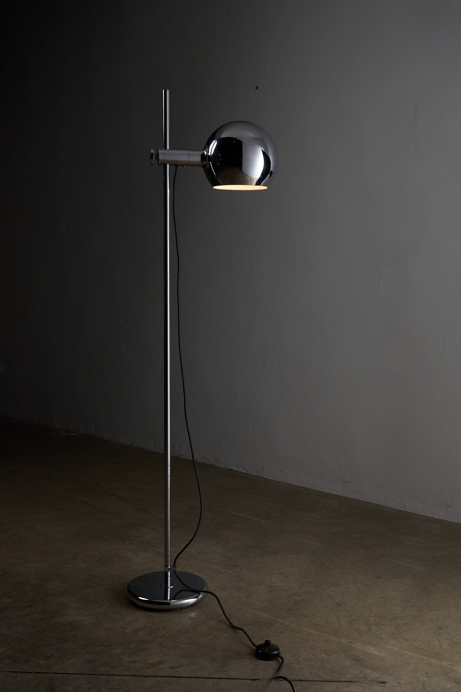 Chrome Sphere Floor Lamp with chrome steel sphere and adjustable shade, designed by Cosack Leuchten, 1960s.