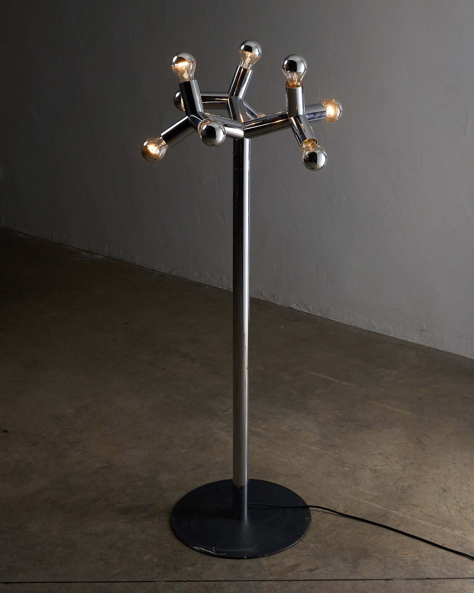 Space Age Atomic Floor Lamp showcasing a sculptural design with polished chrome finish and unique geometric elements.