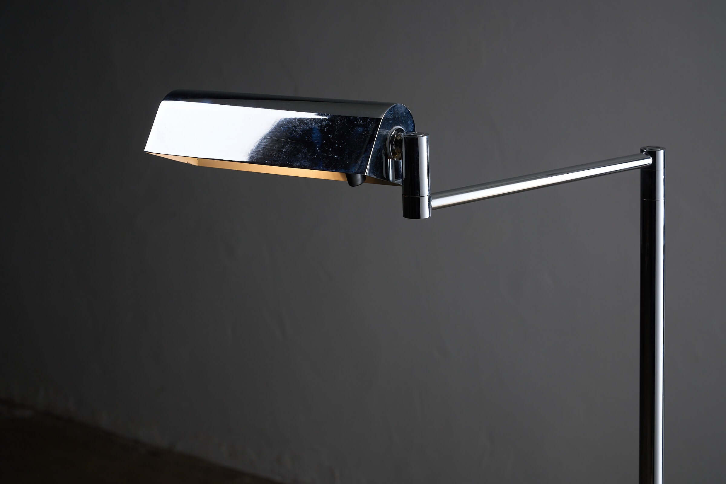George Hanson Floor Lamp with polished chrome finish and adjustable swing arm design.