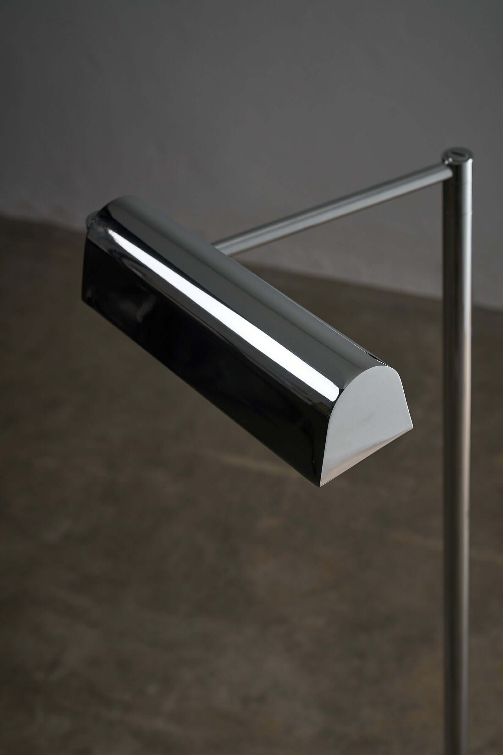 George Hanson Floor Lamp, polished chrome swing-arm design, minimalist style from the 1970s.