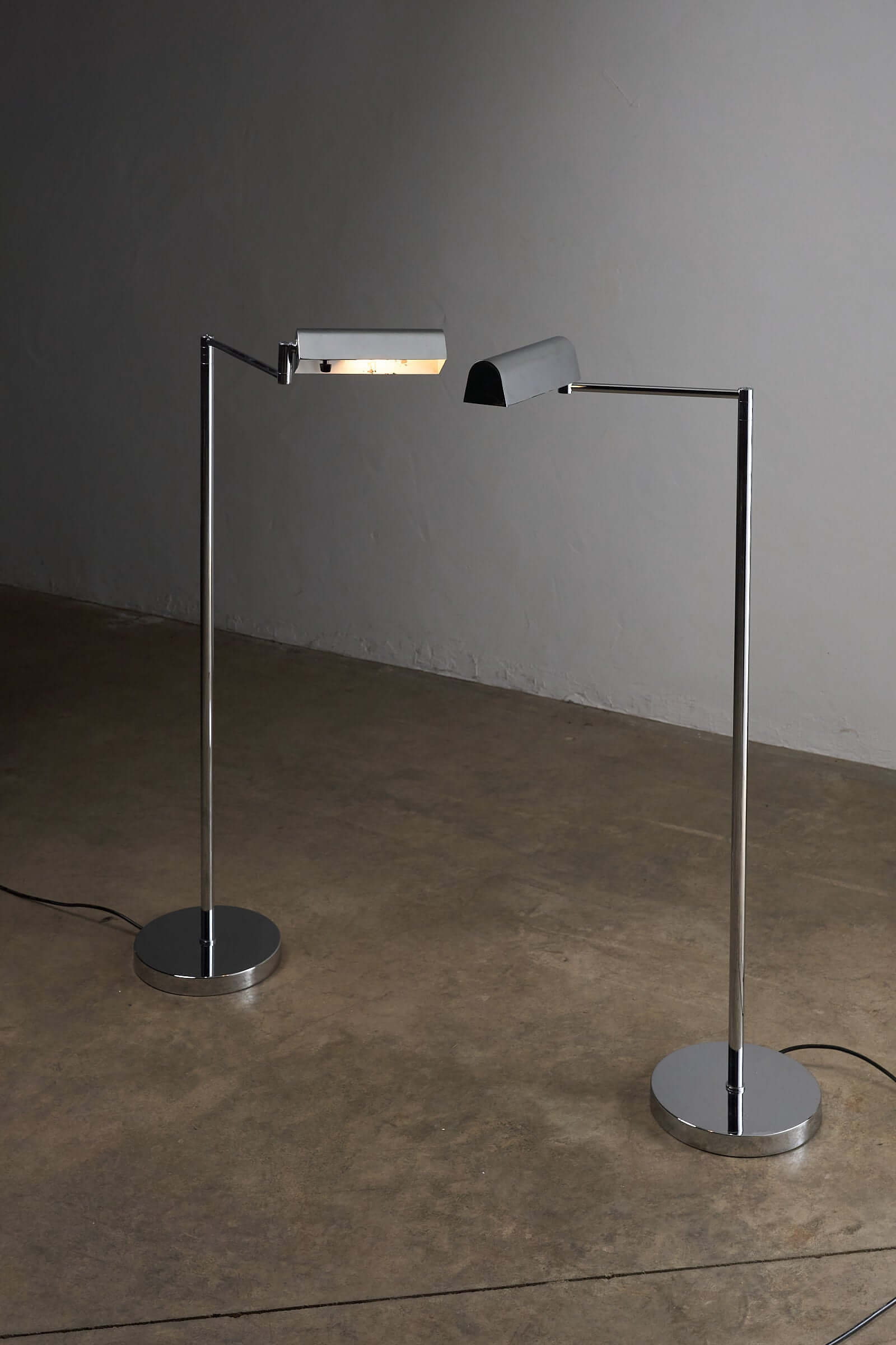 George Hanson Floor Lamp featuring a minimalist chrome swing-arm design from the 1970s.