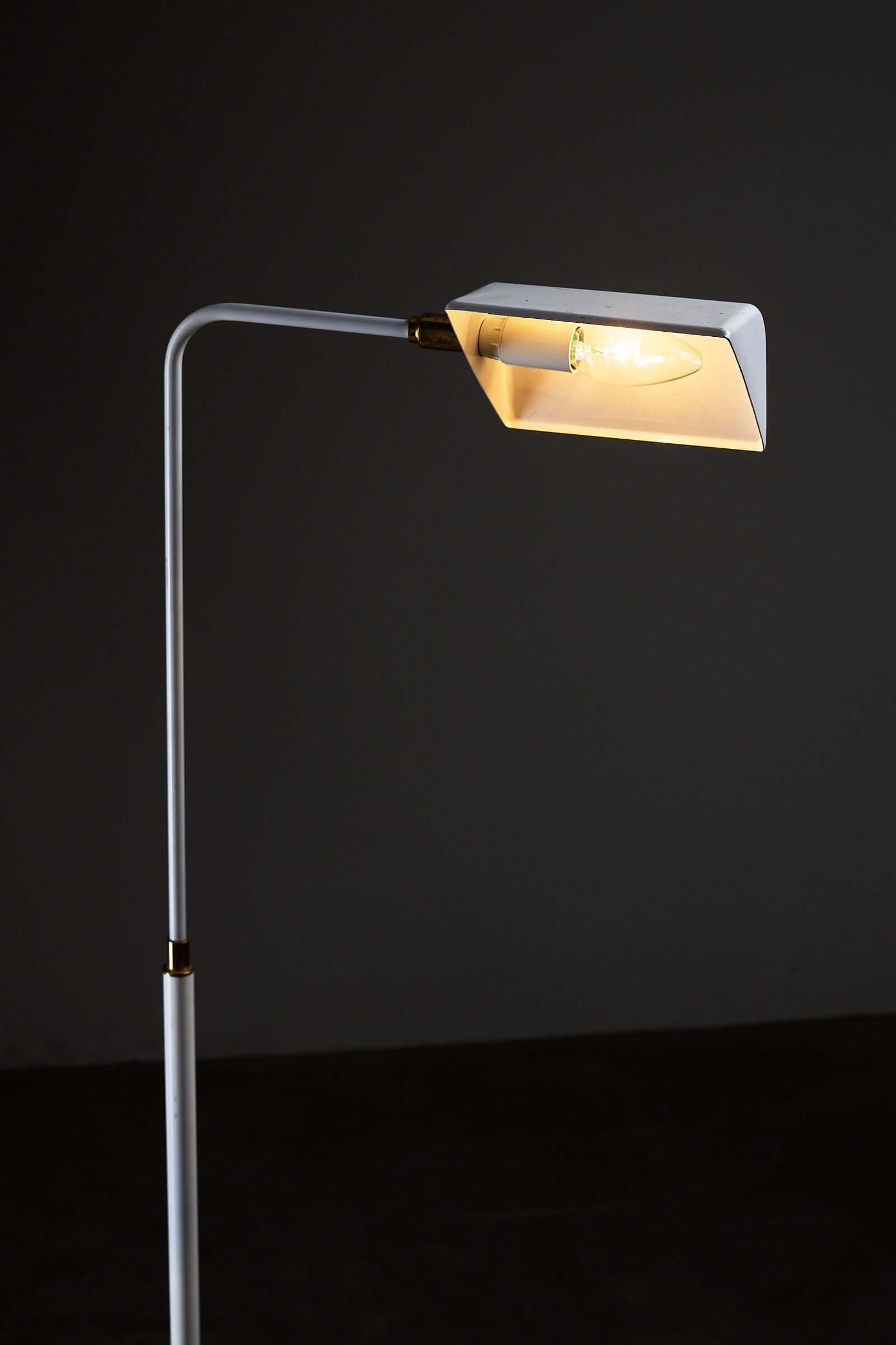 Adjustable Floor Lamp by Boulanger, White Finish with triangular shade and brass details.