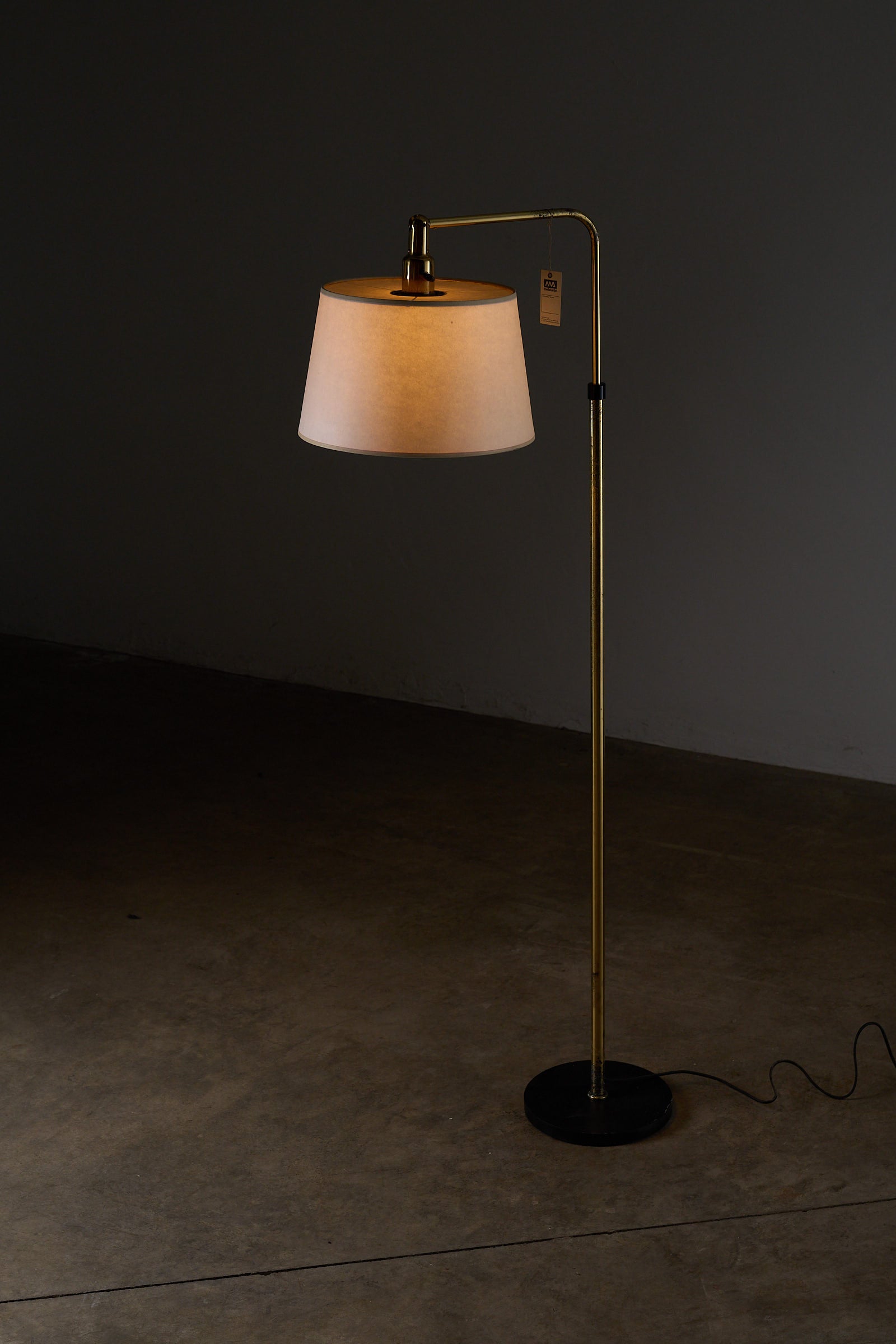 Adjustable Floor Lamp, Metalarte Spain with conical shade and brass stem, perfect for task and ambient lighting.