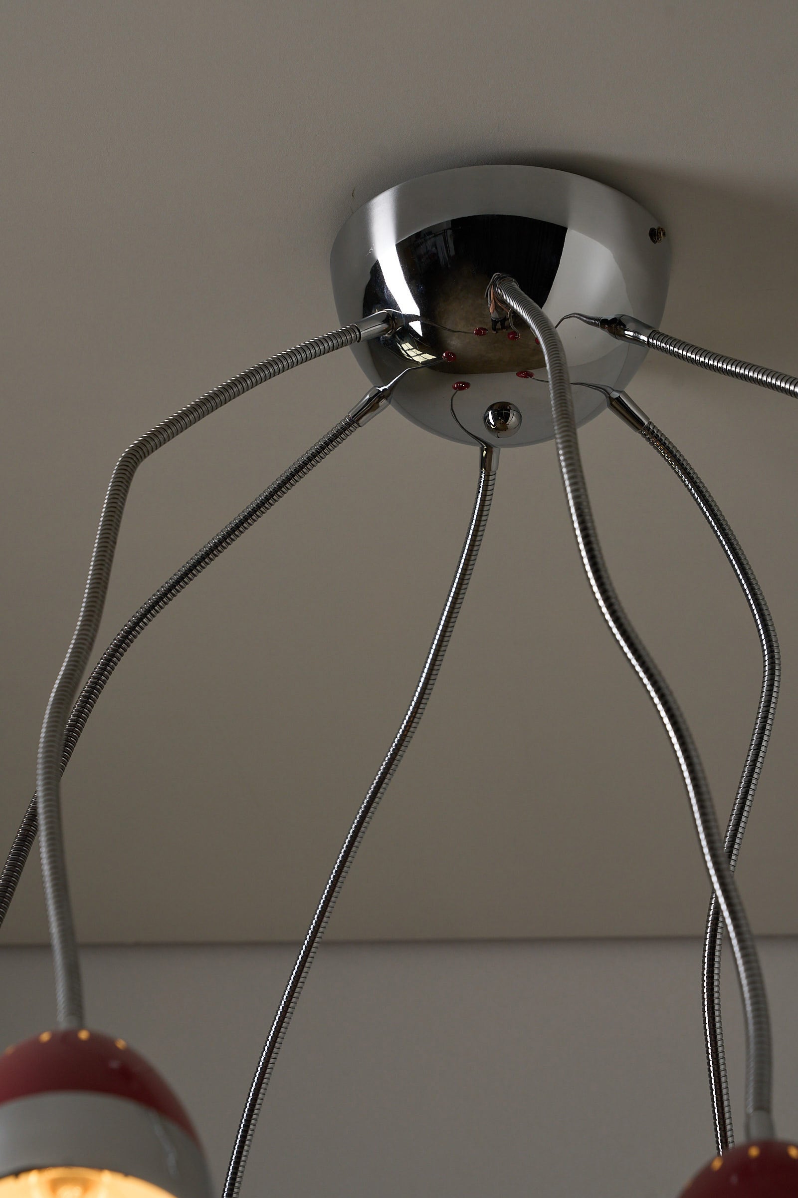 Six-Arm Flexible Ceiling Lamp, Chrome & Bordeaux showcasing chrome canopy and flexible arms.