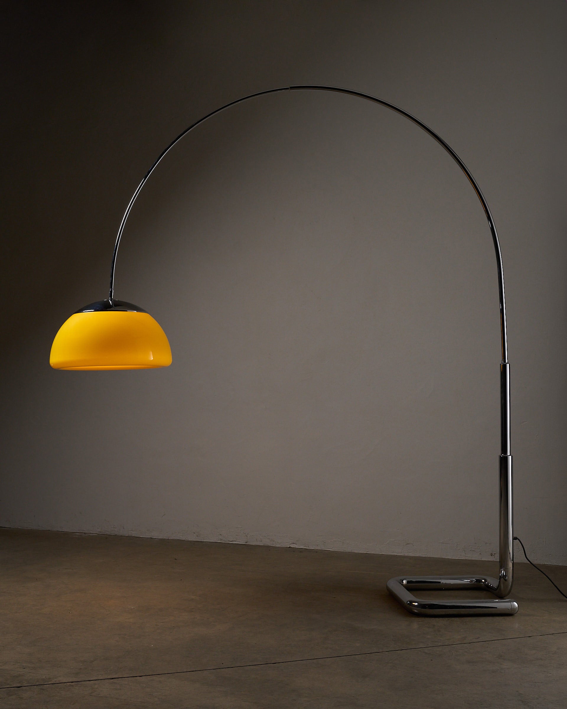 Arc Floor Lamp Acrylic Shade, Cosack (c. 1970s) featuring yellow shade and chrome arc design.