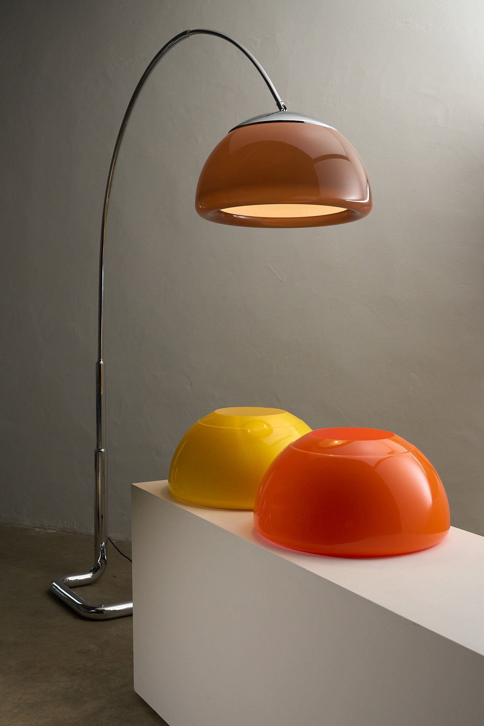 Arc Floor Lamp Acrylic Shade, Cosack (c. 1970s) featuring yellow, orange, and brown shades with chrome arc design.