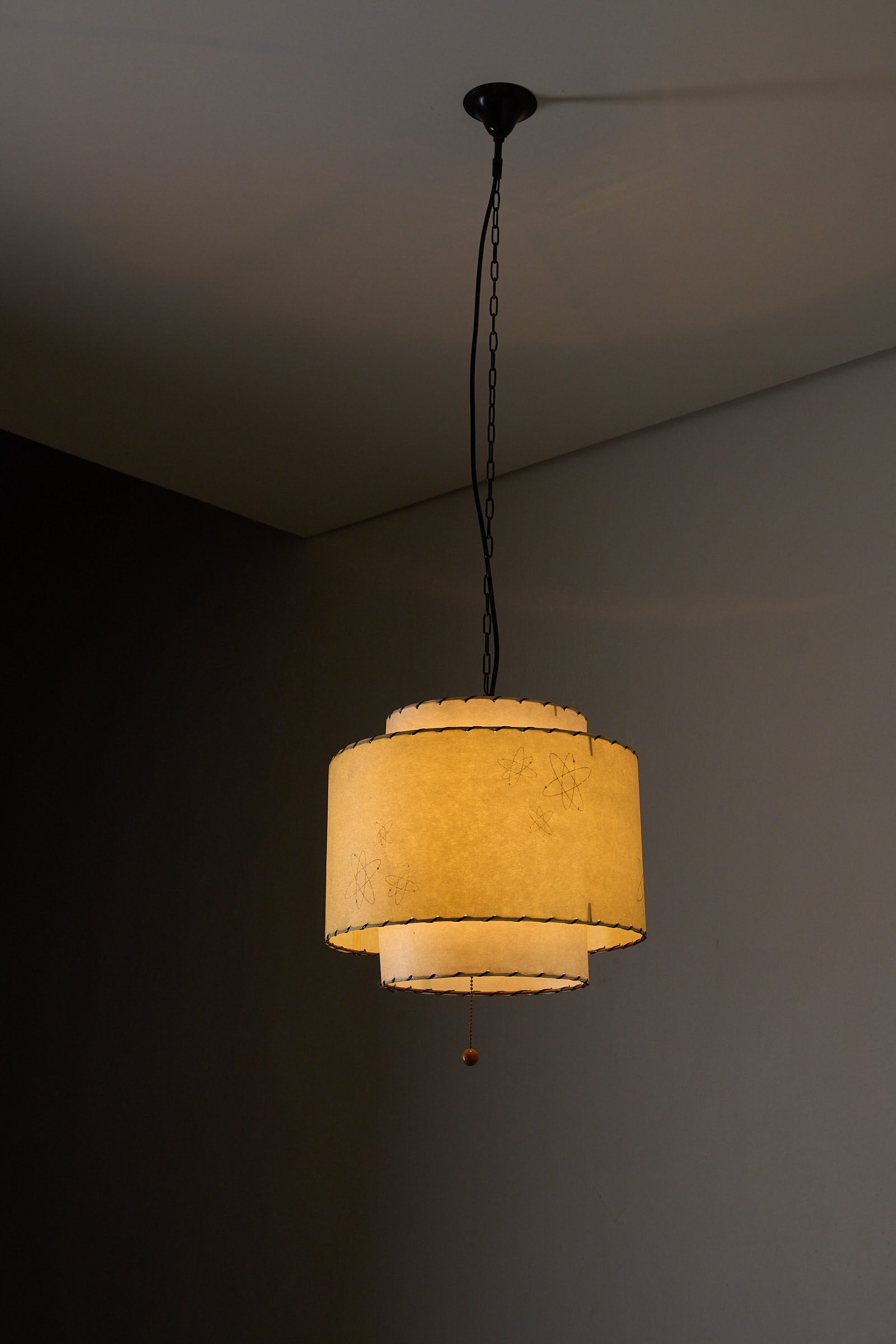 Atomic Pendant Lamp by Archaic Smile Inc, large double-tier parchment shade with atomic pattern.
