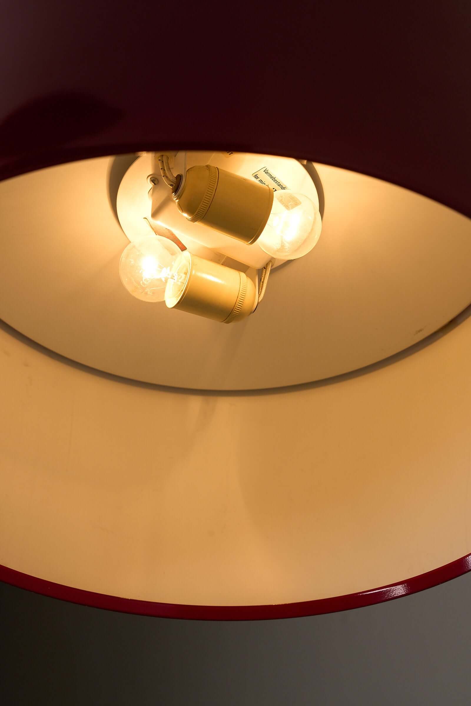 Fog & Mørup Drum Pendant in Bordeaux interior view showing light bulbs inside the large cylindrical shade.
