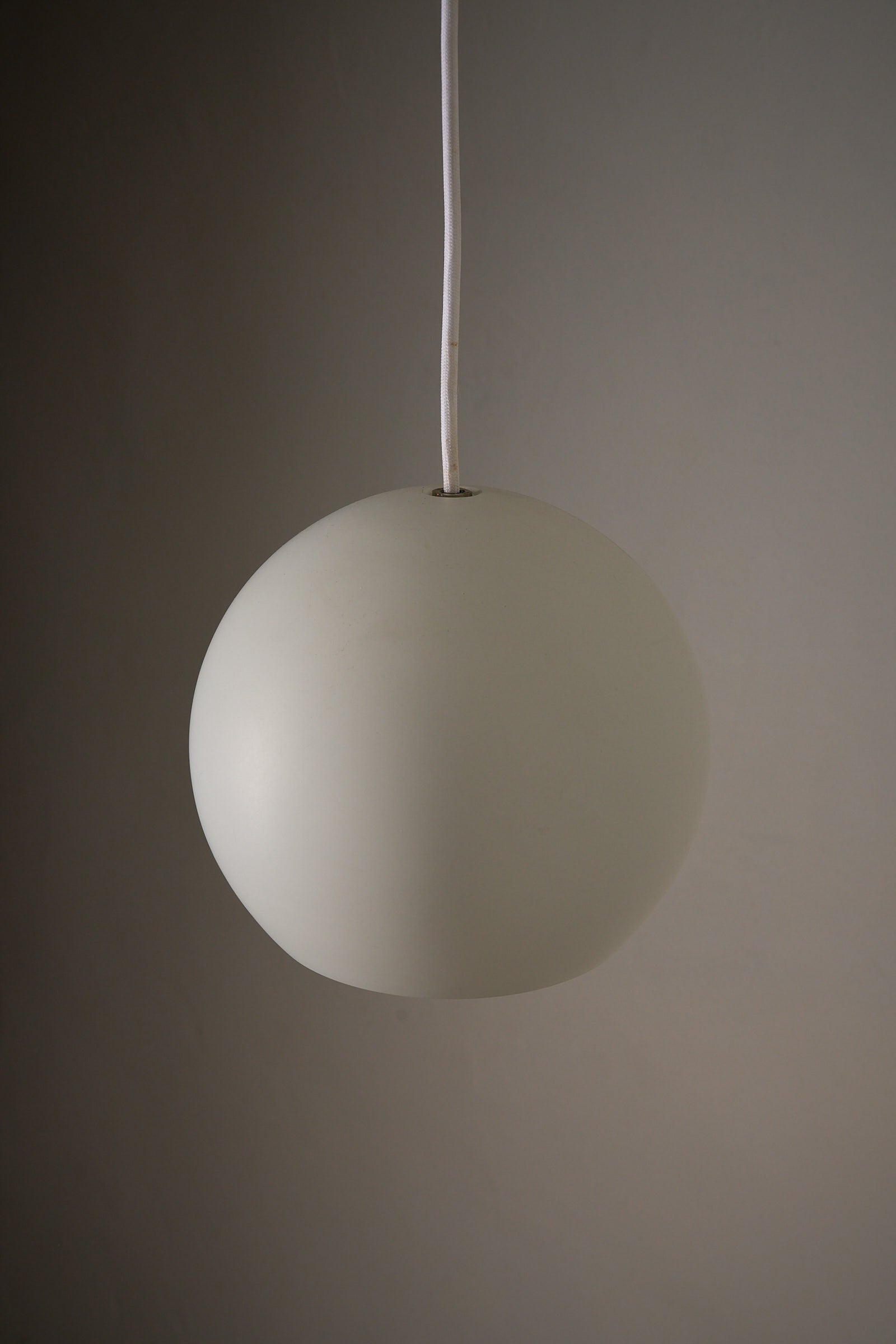 Light Grey Sphere Pendant  by Karl-Heinz Kinsky for Cosack, soft matte ceiling lamp showcasing mid-century design.