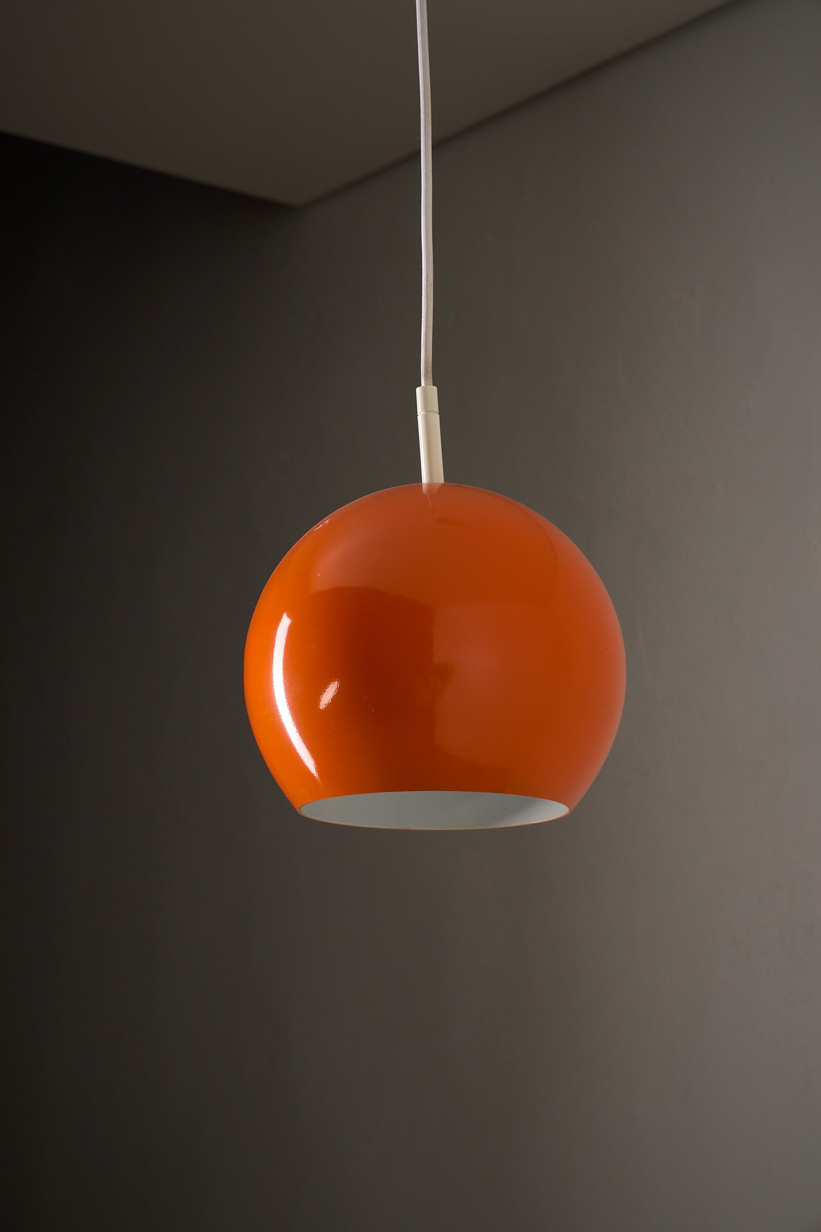 Orange Sphere Pendant by Karl-Heinz Kinsky for Cosack hanging lamp in glossy orange finish.