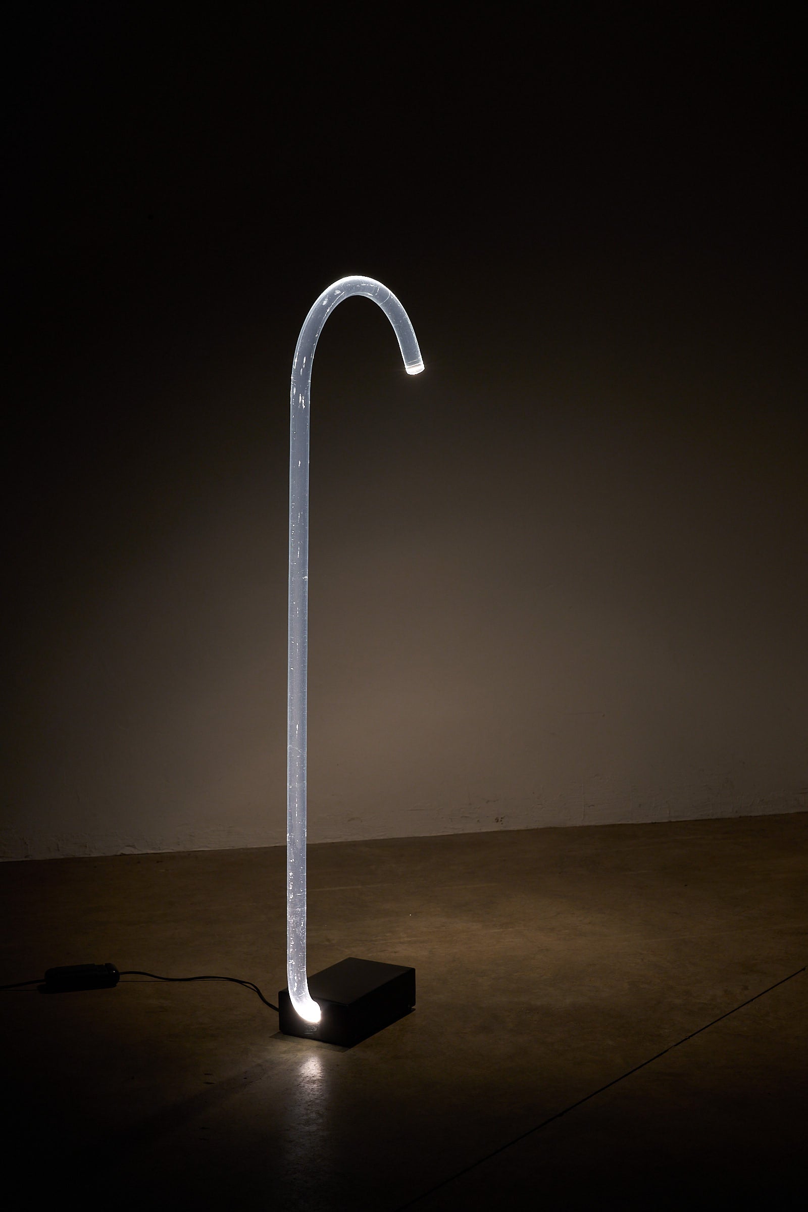 "King" Floor Lamp by Edy ten Berge features a transparent acrylic tube illuminating downward.