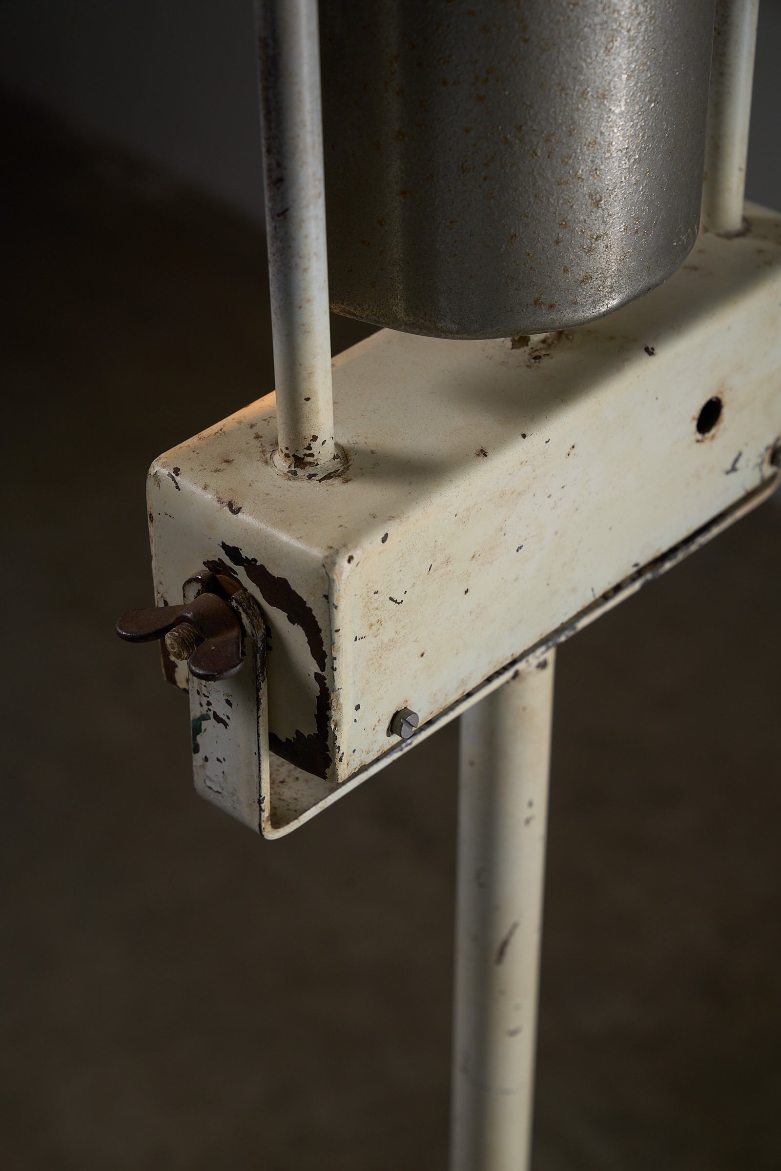 Industrial Medical Floor Lamp, Adjustable Enamel and Metal Construction close-up of base and reflector detail.
