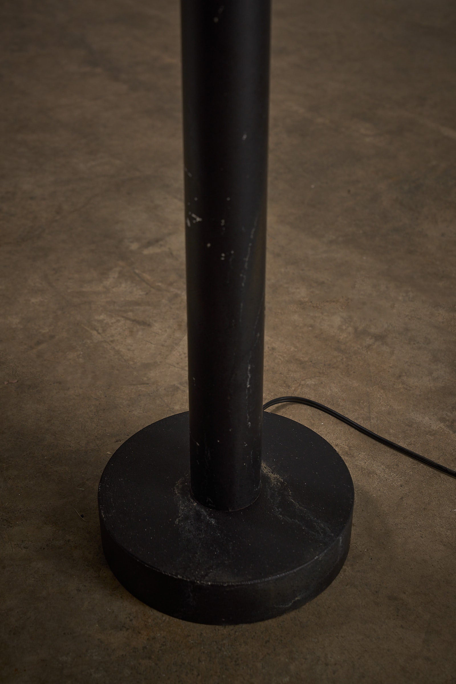 Base of the Tall Outdoor Lantern by Boom BEGA showcasing the cylindrical post and round base design.