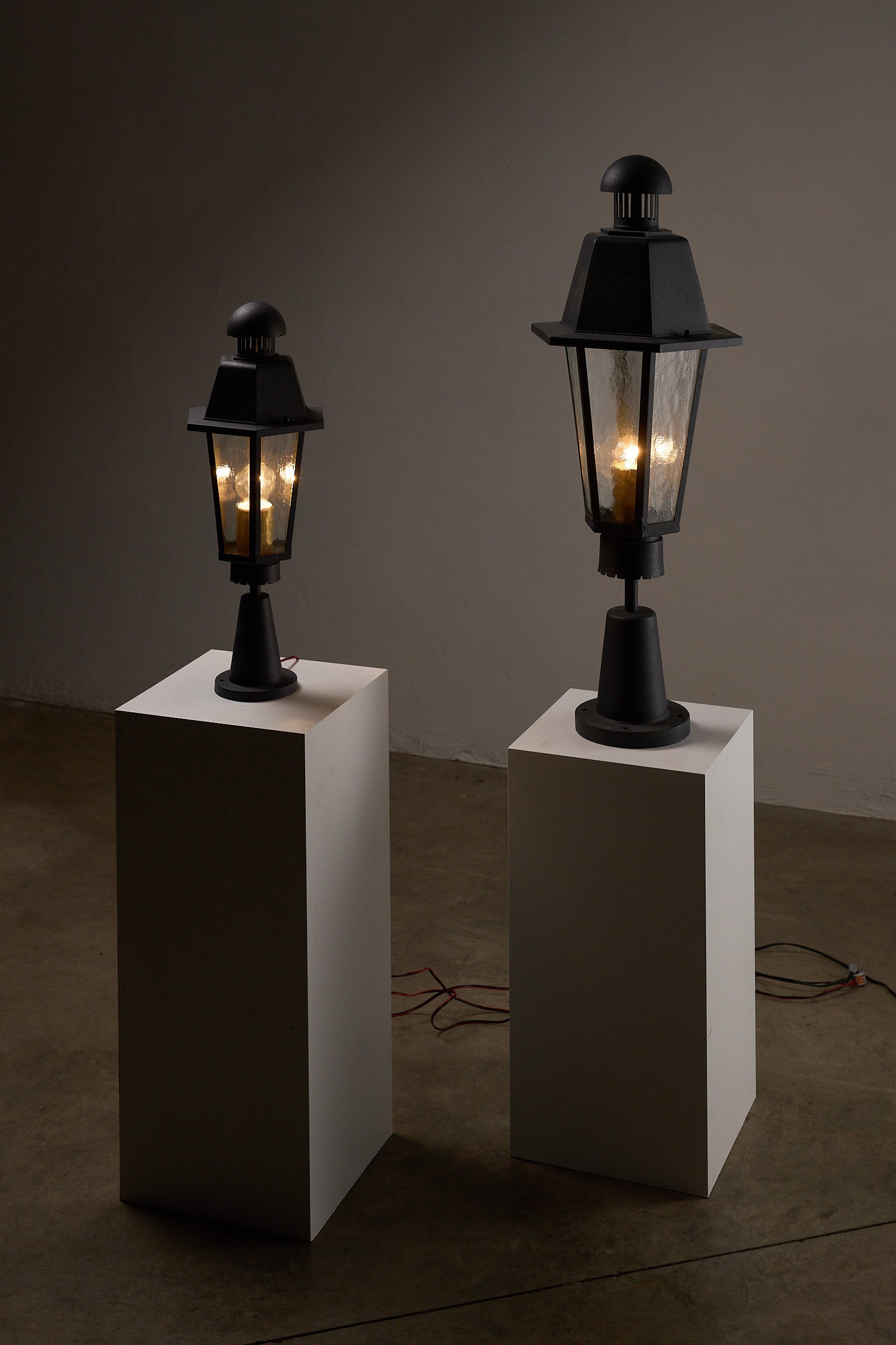 Boom BEGA Outdoor Lantern Large displayed alongside a smaller version, showcasing their elegant design.