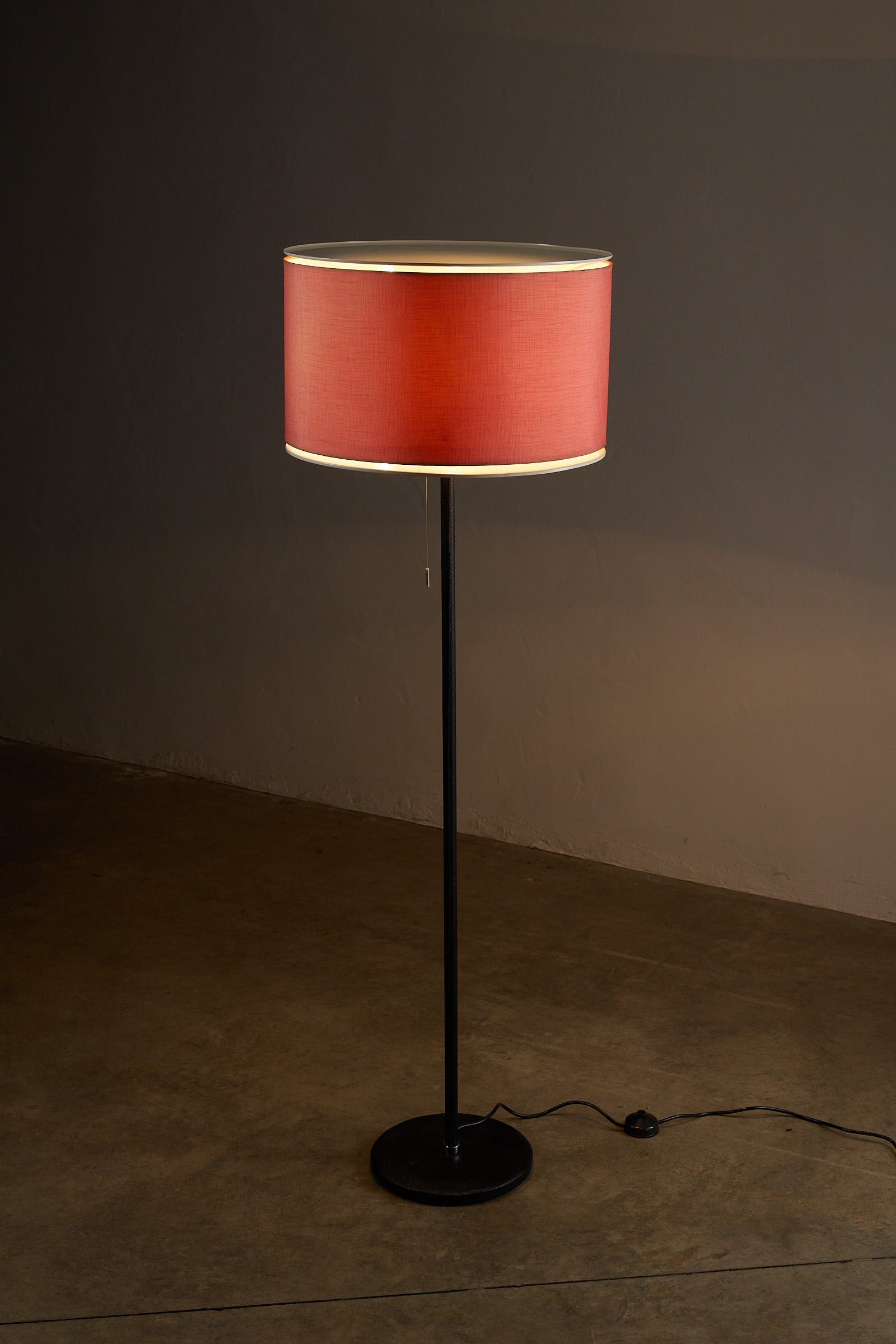 Floor Lamp by Staff Leuchten with Bordeaux Shade and Leather Base in a stylish interior setting.