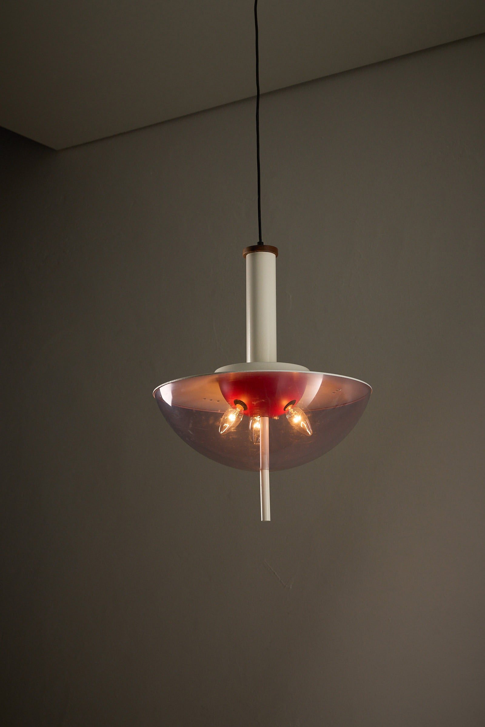 Ceiling Lamp with With Metal Structure and Tinted Acrylic Dome hanging from ceiling, featuring a violet dome and white stem.