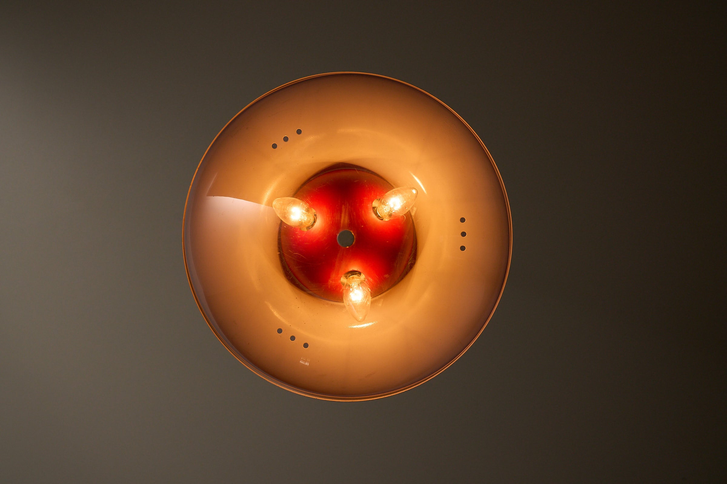 Ceiling Lamp with With Metal Structure and Tinted Acrylic Dome showing the translucent dome and bulbs from above.