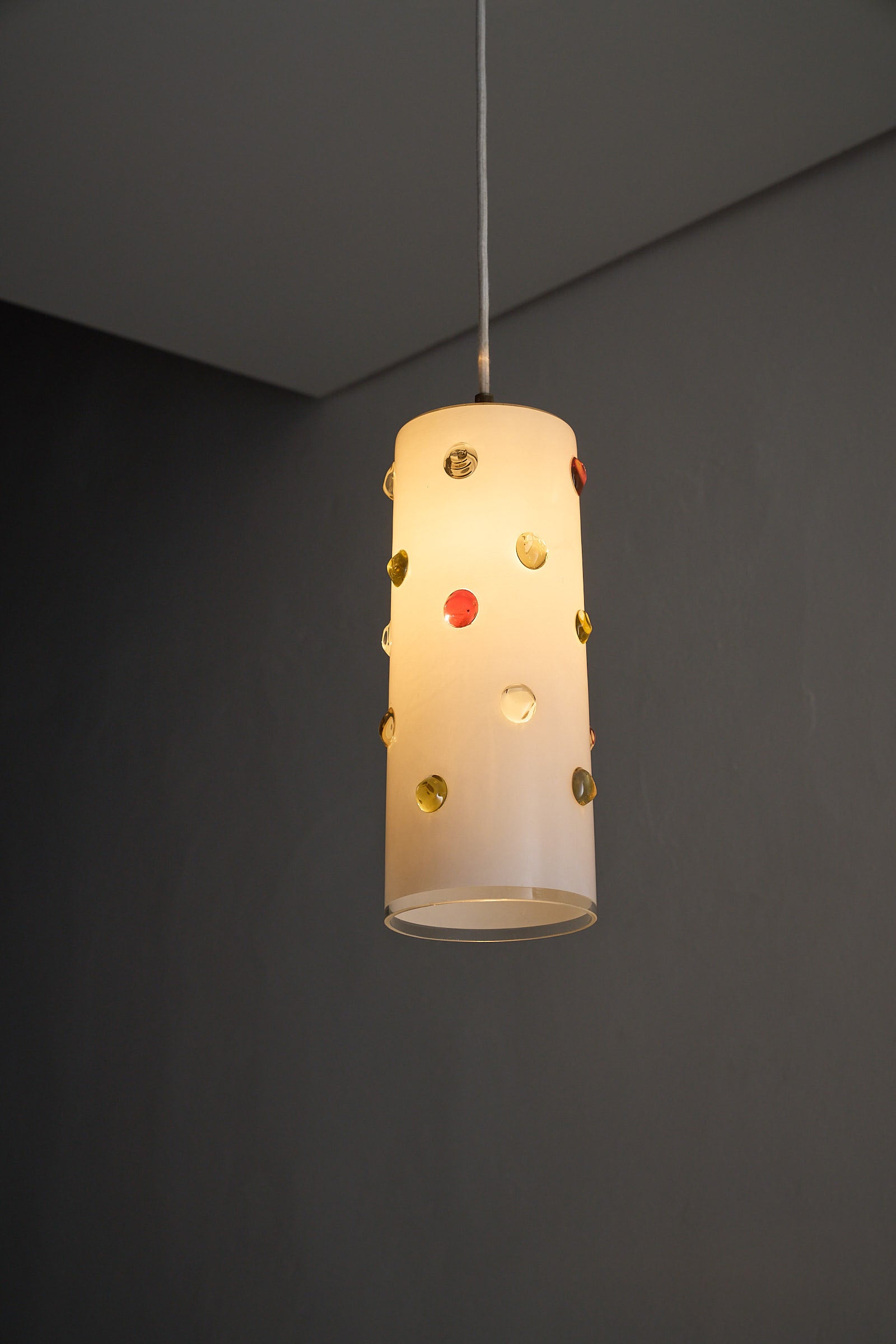 Vistosi Pendant Lamp With Colored Dots featuring a satin white glass shade and colorful decorative dots.