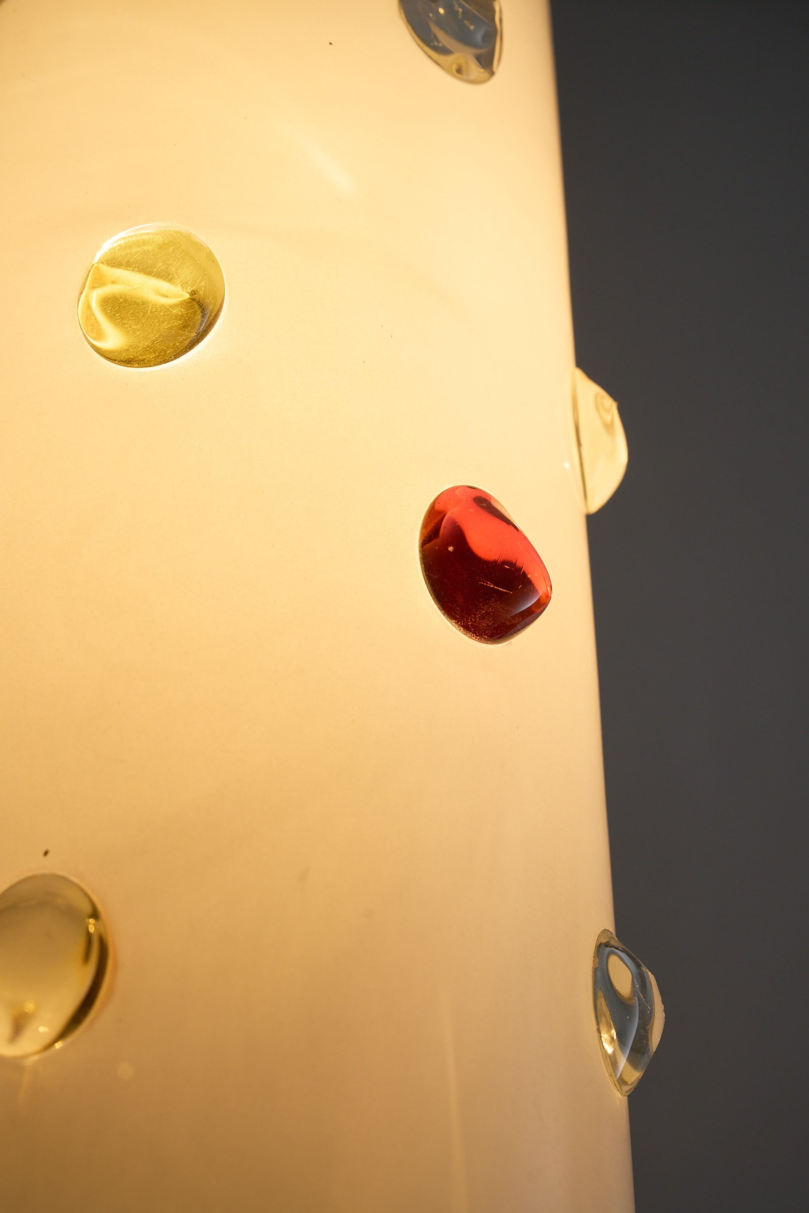 Close-up of Vistosi Pendant Lamp With Colored Dots featuring colorful glass accents in yellow, red, and blue.